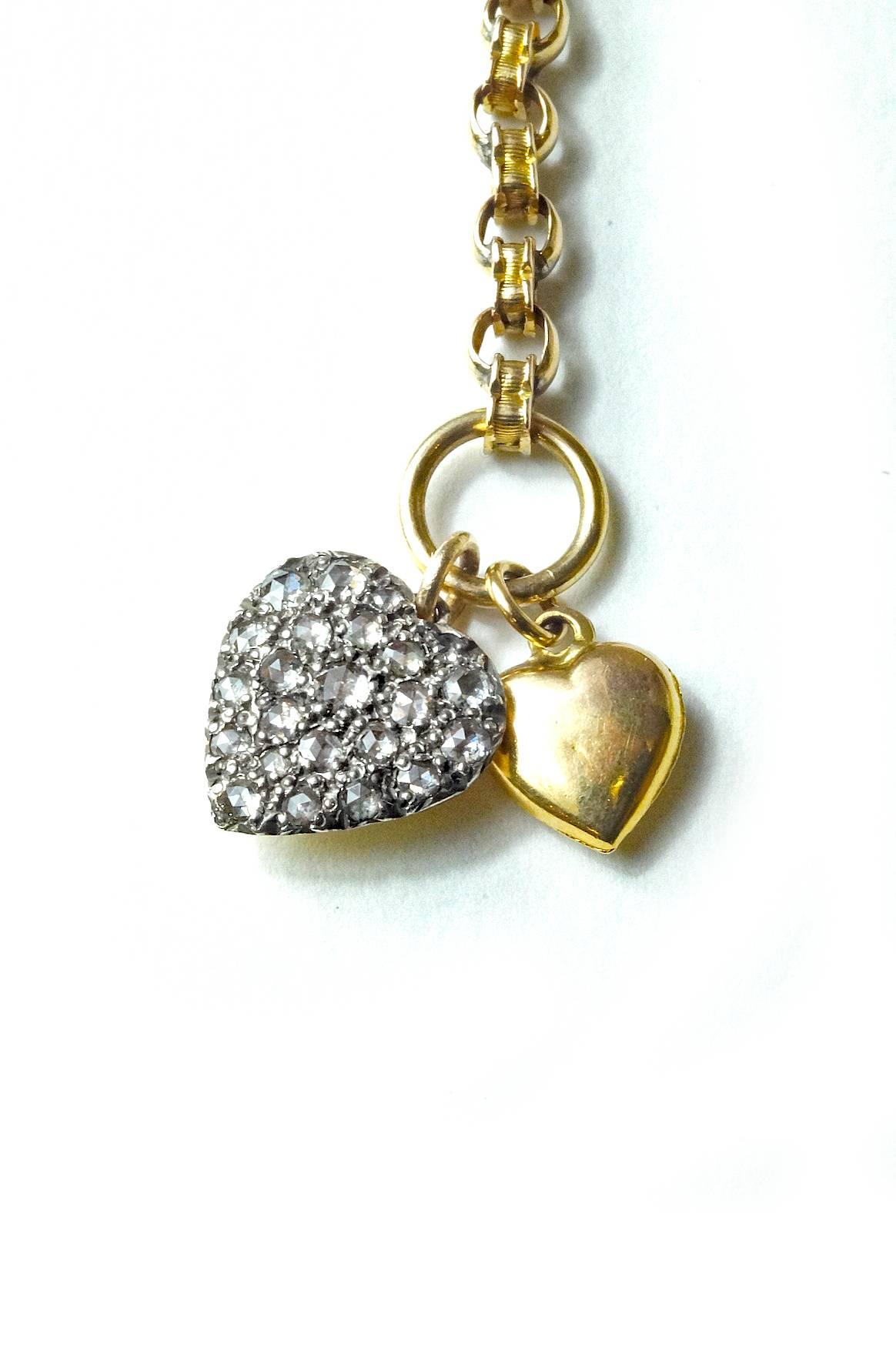 I collect old chain and antique charms and assemble these charm necklaces making each one a one of a kind. Easy and fun to wear and are great for everyday jewelry.  This one has a Victorian bug at the top ring and two antique hearts at the bottom. 