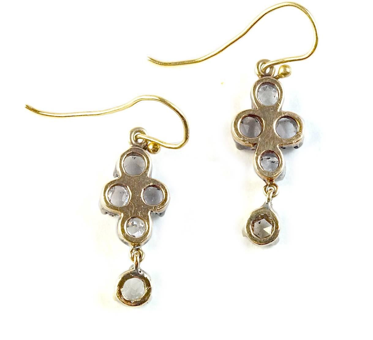 The perfect earring to wear everyday!!!  Just the right amount of sparkle!!! Circa 1890, silver over 14 kt yellow gold, 10 rose cut diamonds for a 1.00 ct combined weight.  These hang from a wire.