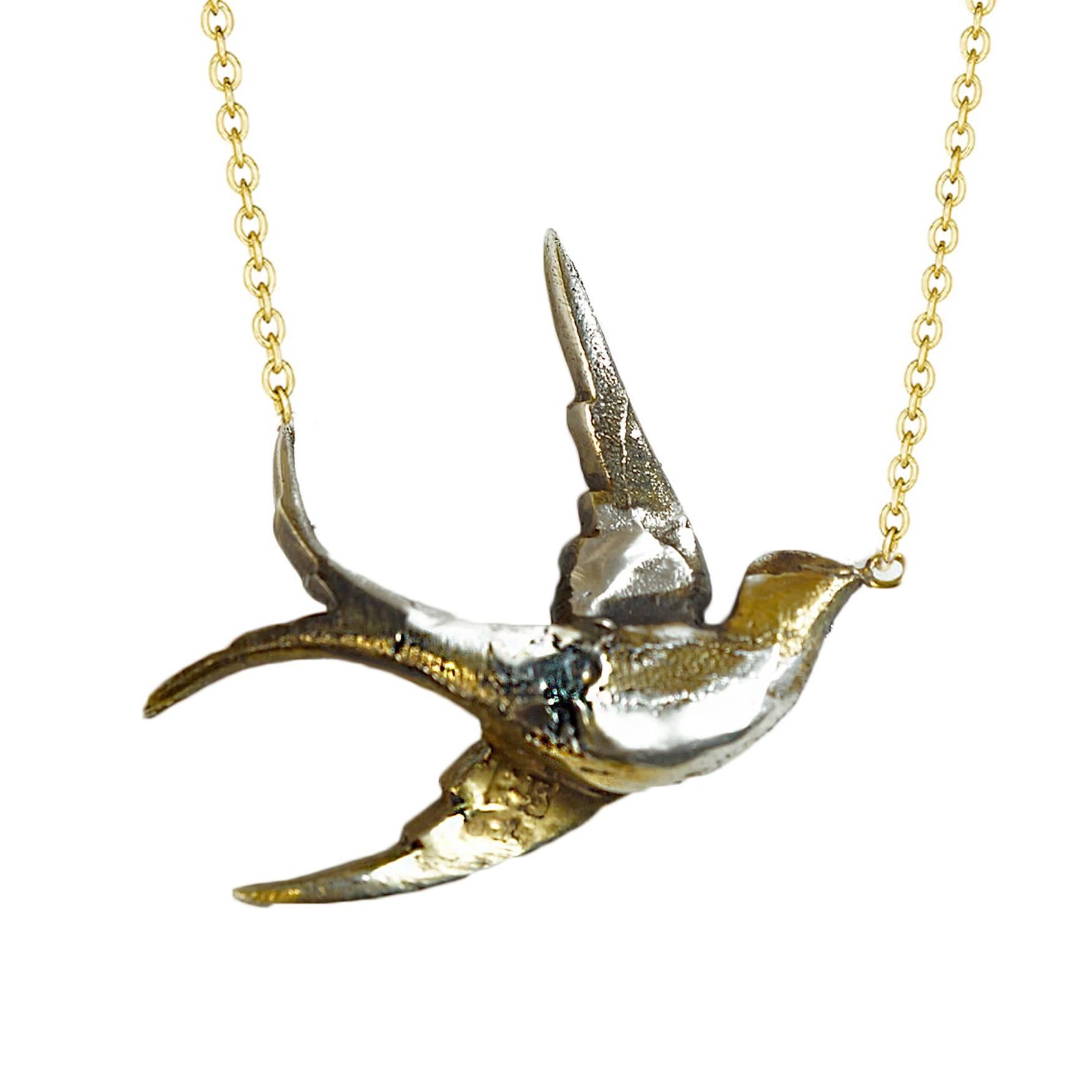 A gorgeous sapphire and diamond bird from the Victorian era!  This precious little bird is made of sterling silver topped with gold and portrays a bird in flight. Victorian jewelry designs began to reflect sentimental thoughts and feelings and these