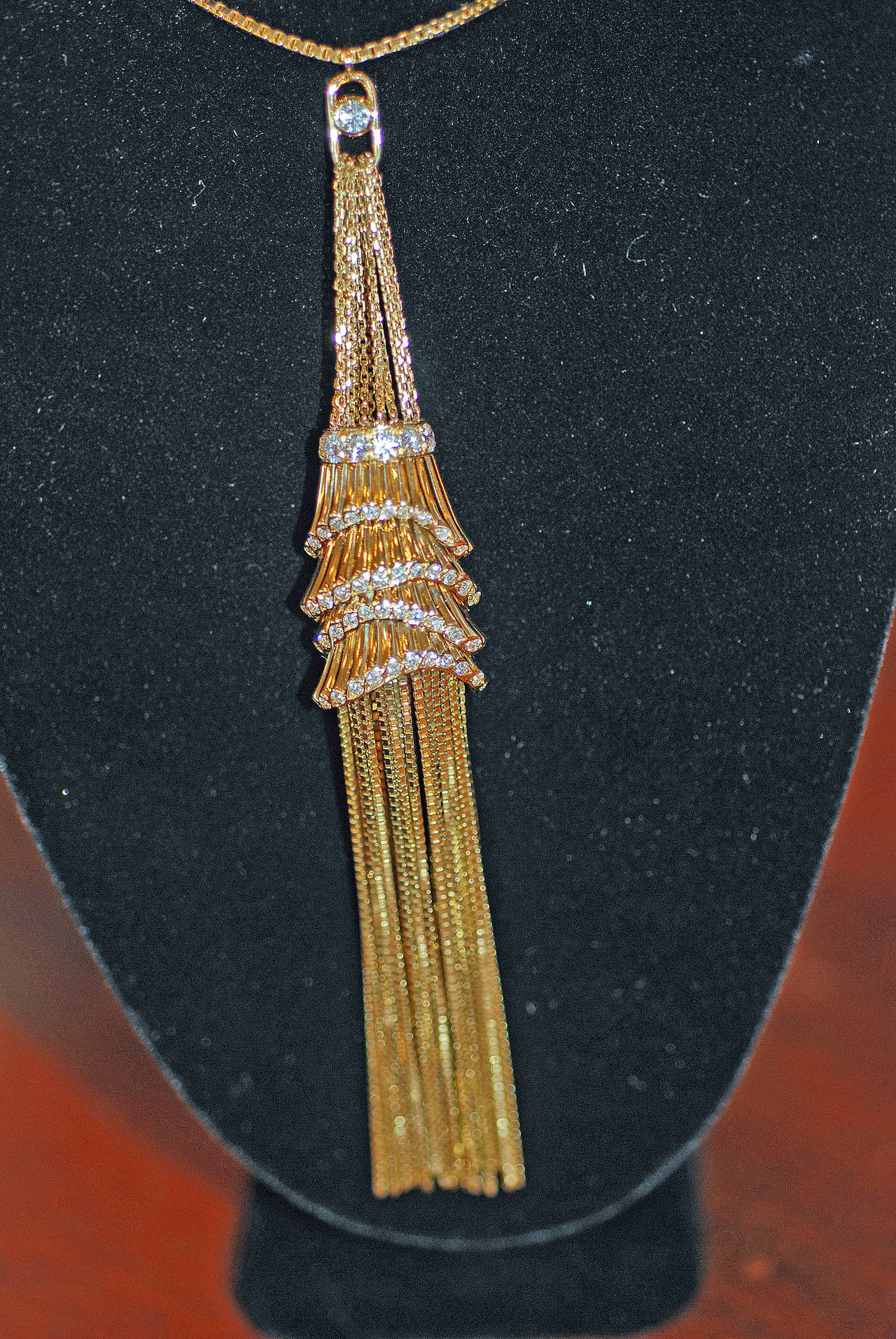 Exquisite 18k Gold and Diamond Boucheron Tassel from the Frou Frou Collection
Tassel measures 5