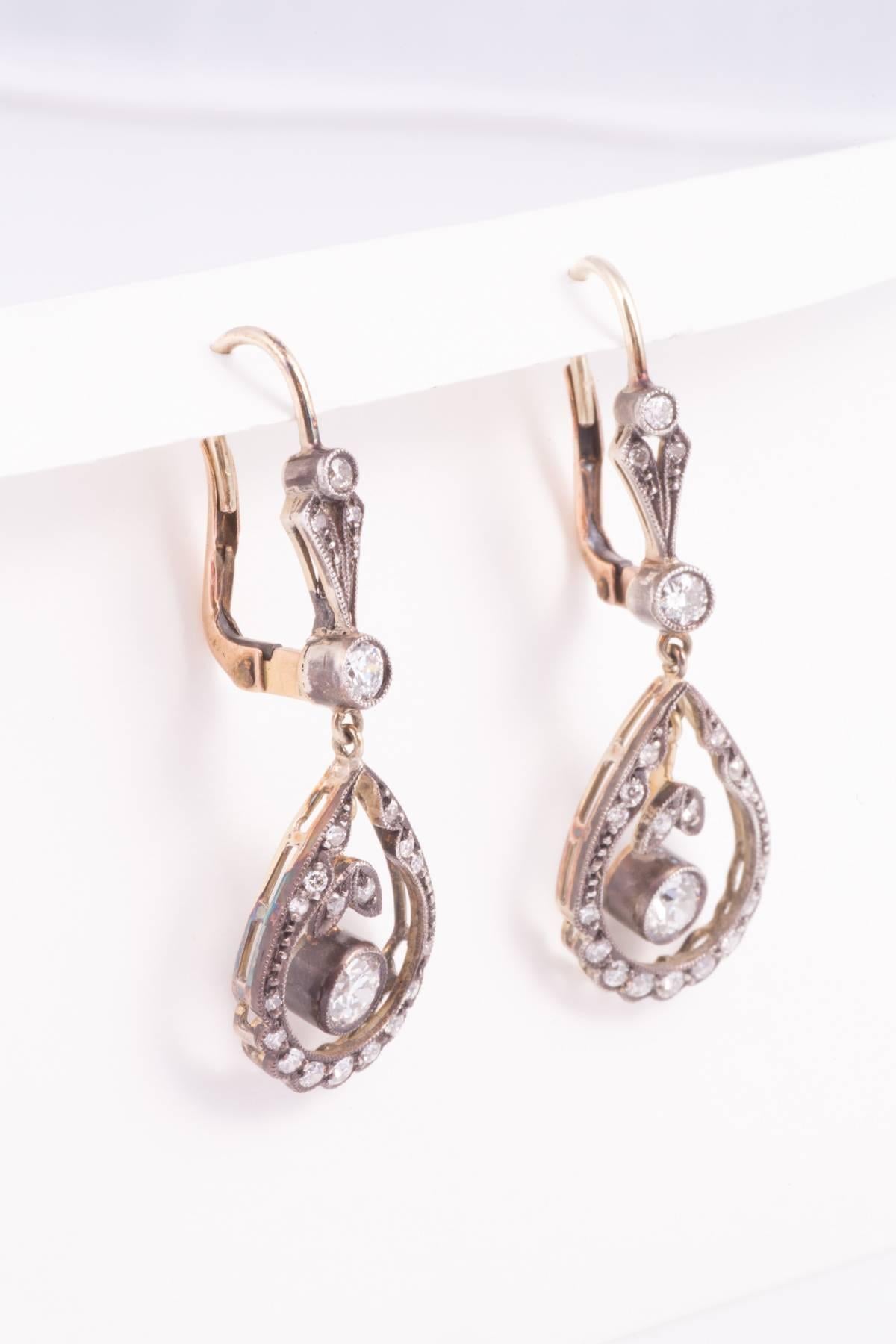 Silver top gold back diamond earrings. The diamond drops are approx. .50ct  each, 1.60ct/tw circa.1900.  Diamond drops are approx. .50ct each, The earrings are approx.1.60ct/tw circa.1900. 