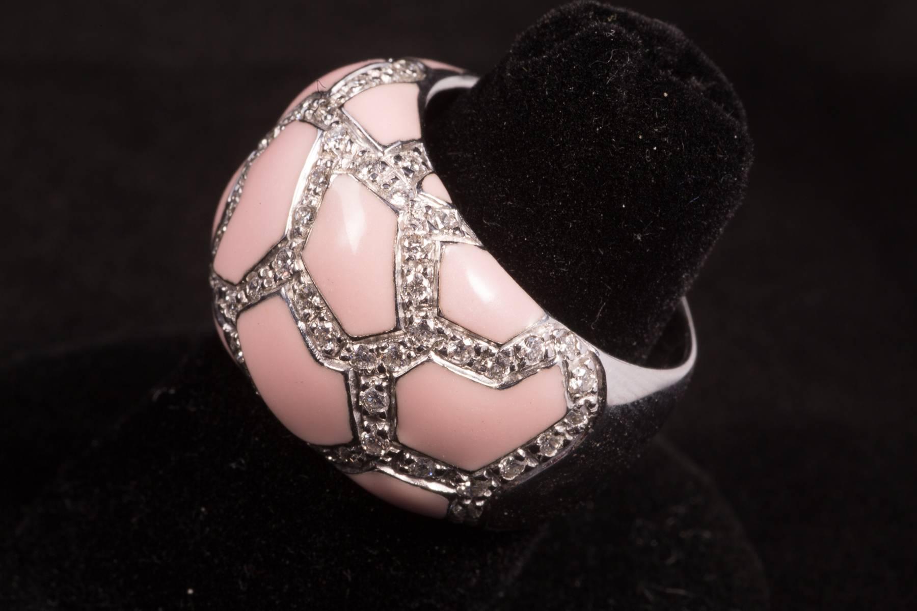 Roberto Coin pink enamel and pavé diamond ring. The ring is in 18k white gold and made in Italy. There are approx. 2.00cts of pavé diamonds. Ring size 6.75, possibly a 7.