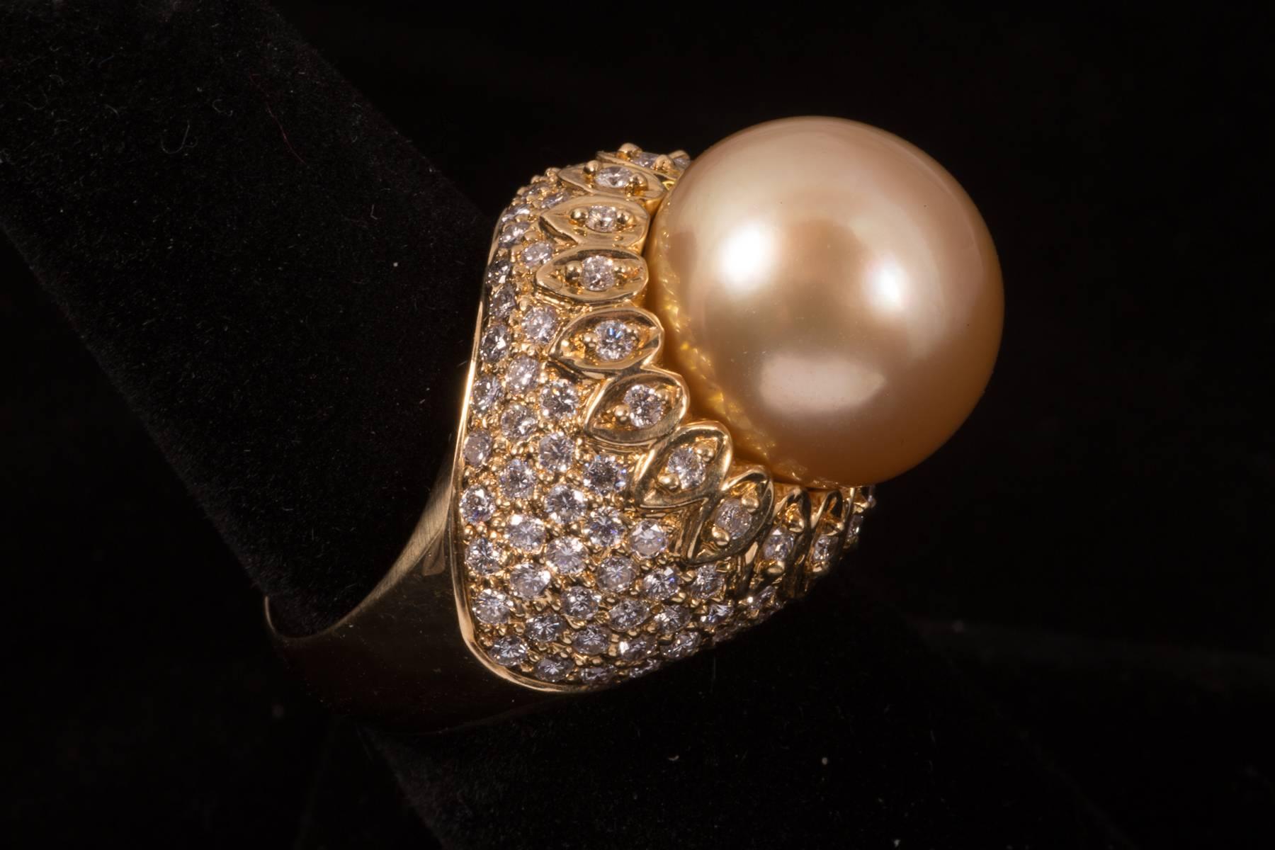 Fabulous Golden Pearl and Diamond Ring. The Pearl measures 14.28 mm with 1.85 carats of Round Brilliant Diamonds
Size 6