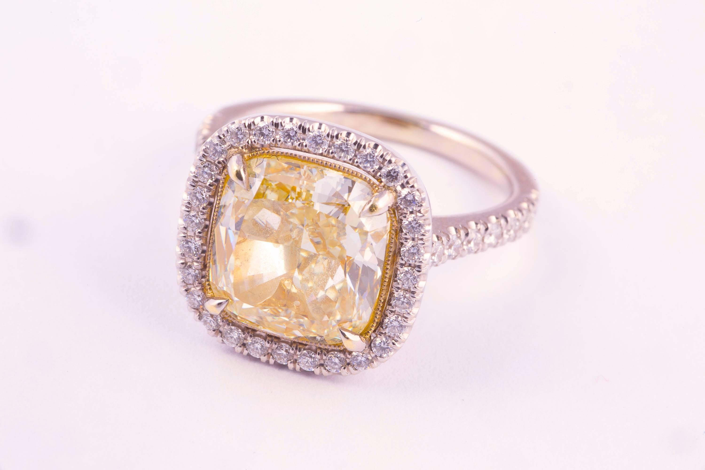 Beautiful 5.11 Carat Natural Fancy Yellow Diamond Two Color Gold Ring In Excellent Condition In New Orleans, LA