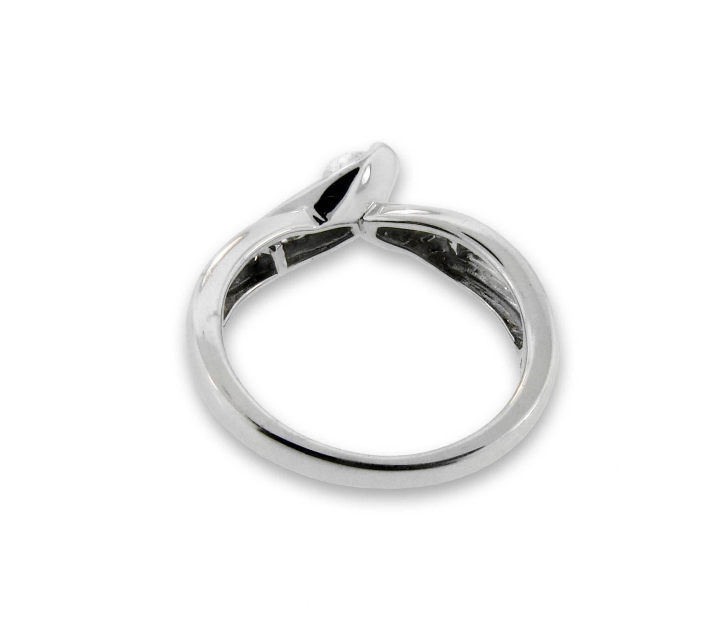 Women's Sparkling White Diamond 14 Karat White Gold Engagement Ring Flowing Design For Sale