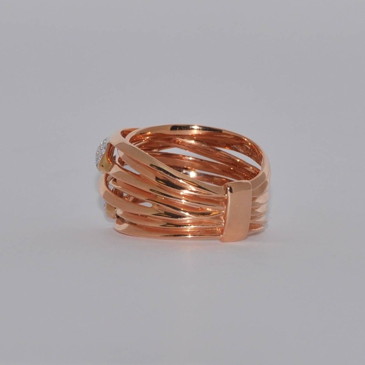 Discover this Diamonds 0.32 Carat and Rose Gold 18 Carat Cocktail Ring.
Diamonds Brilliants 0.32 Carat
Rose Gold 18 Carat
French Size 54/ US Size 6 3/4
