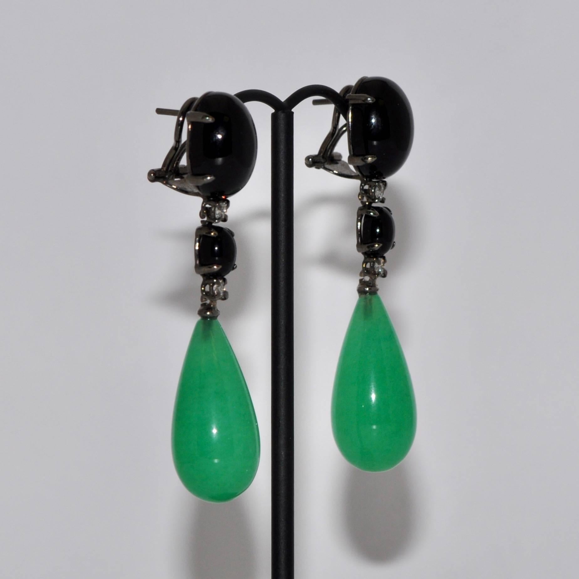 Discover this Jade, Black Agate and White Diamonds on Black Gold Chandelier Earrings.
Jade
Black Agate
White Diamonds 0.28 Carat
Black Gold 18 Carat