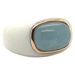 Anillo de oro rosa de 18 quilates con aguamarina y ágata blanca
