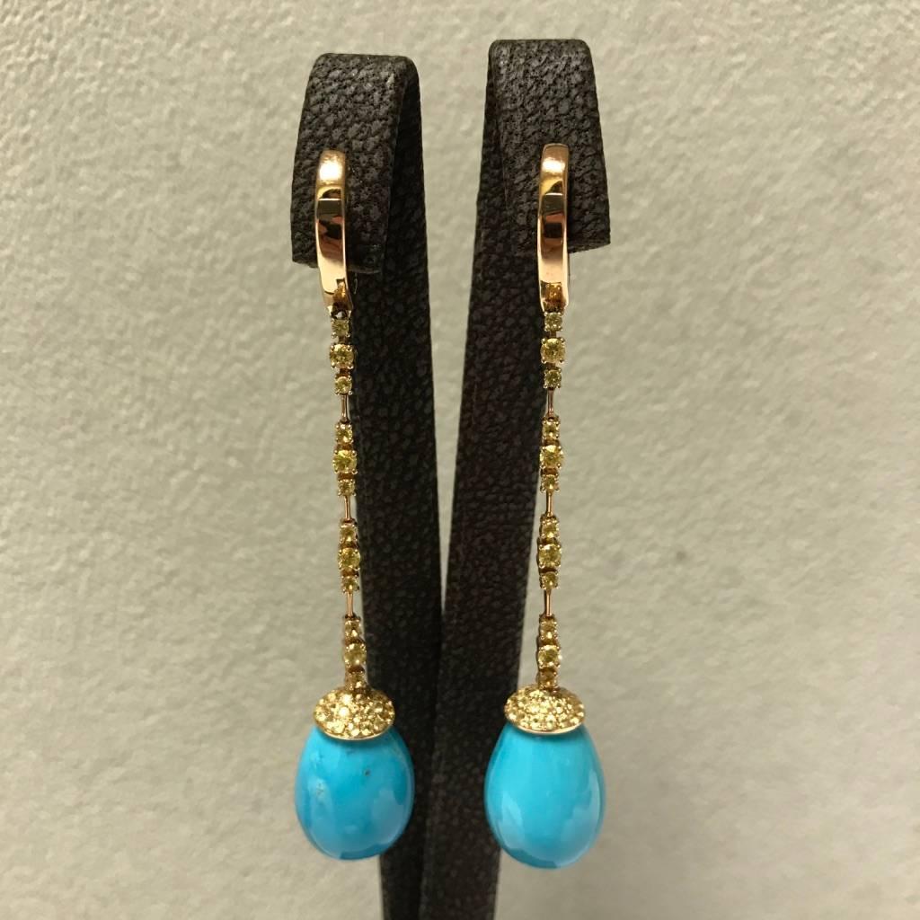 Elegant Chandelier Earrings
Yellow Gold 18 Carat 5,6 gr
Turquoise
Yellow Sapphires
Length : 6,5 cm
