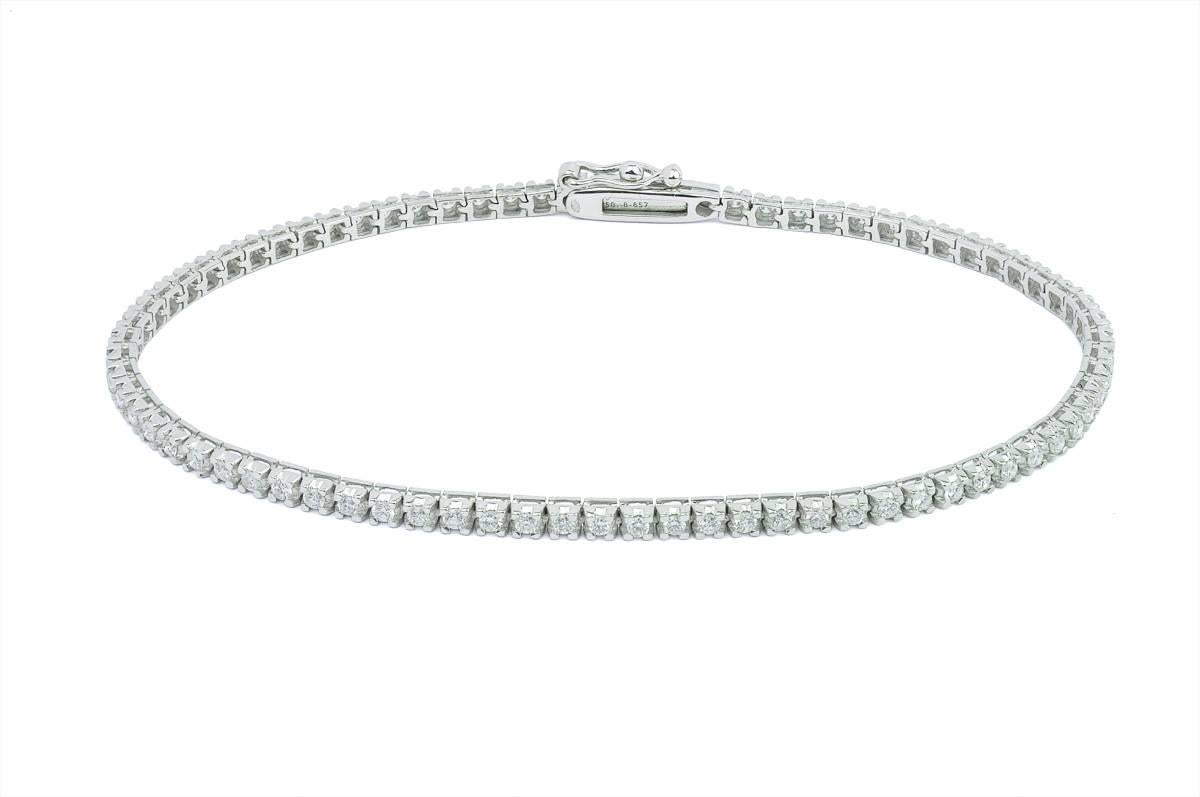 Elegant Tennis Bracelet
White Gold 12 grammes 
Brillant Diamonds 4 Carat Purety G/ SI 
