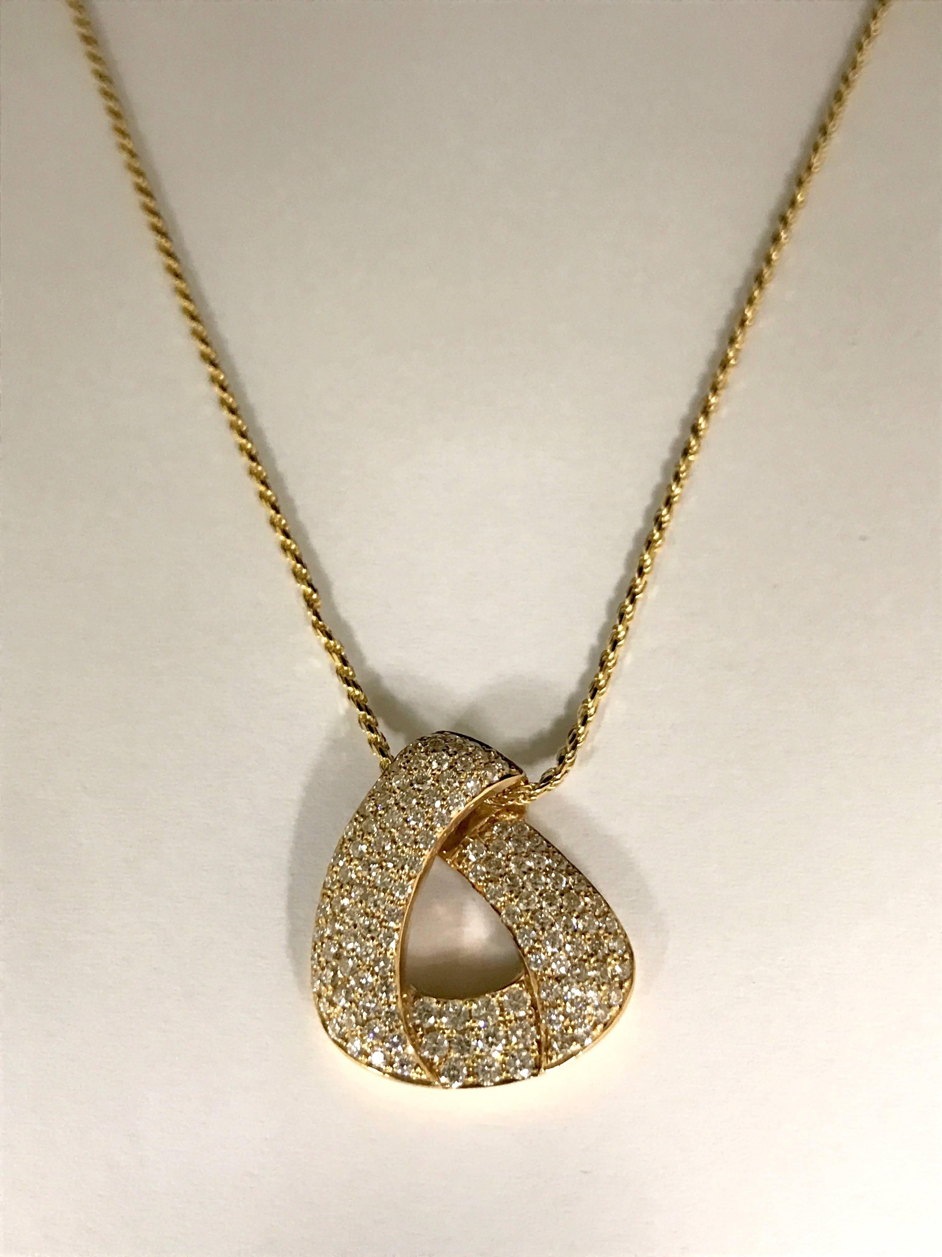 Diamonds and Yellow Gold Pendant Necklace
Yellow Gold 
127 Diamonds 0,960 Carat Form B Purity SI 
Yellow Gold Sliding Rope Chain 
