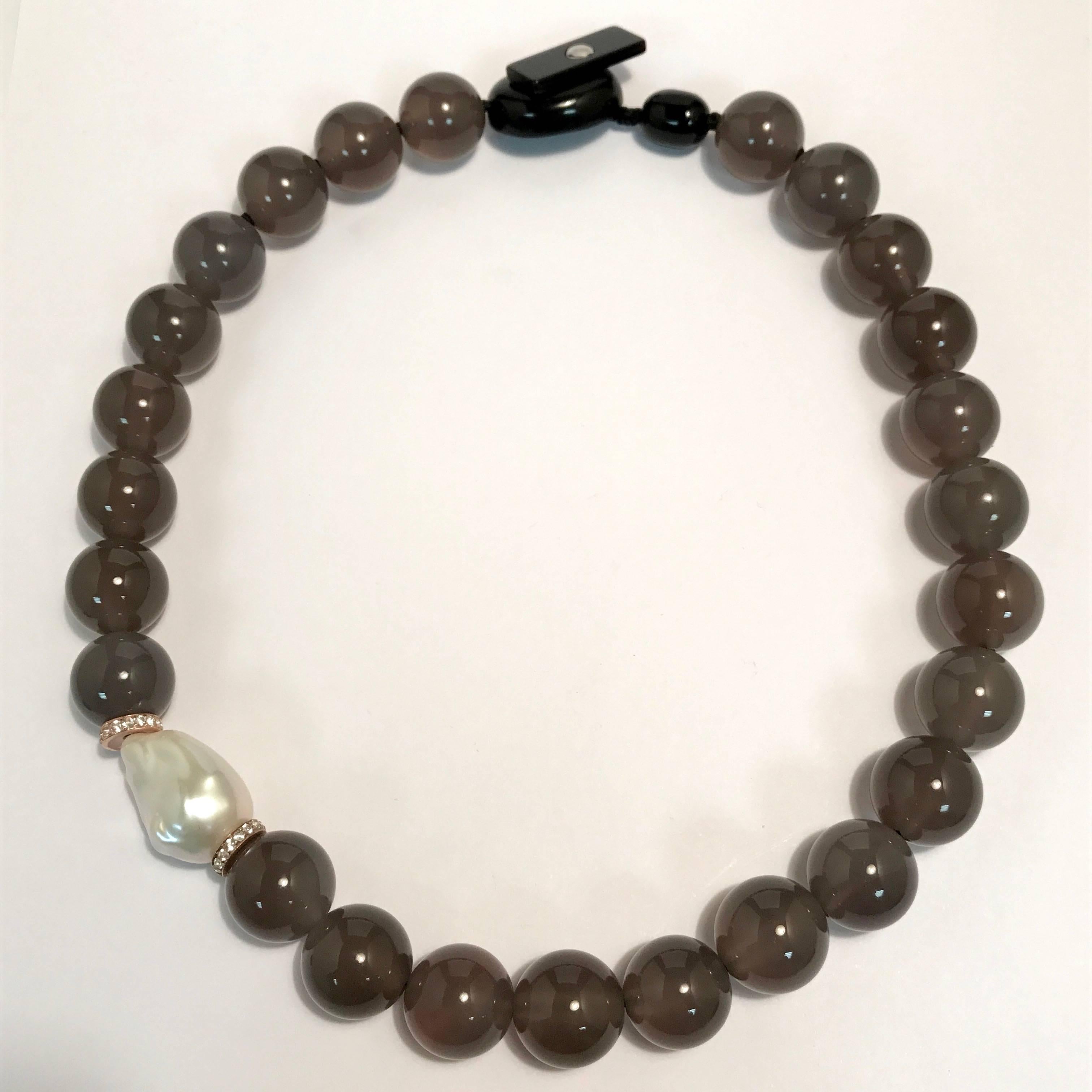 Grey Agates, Green Sapphires and Cultured Pearl Necklace.

Grey Agates
Green Sapphires
Cultured Pearl Necklace