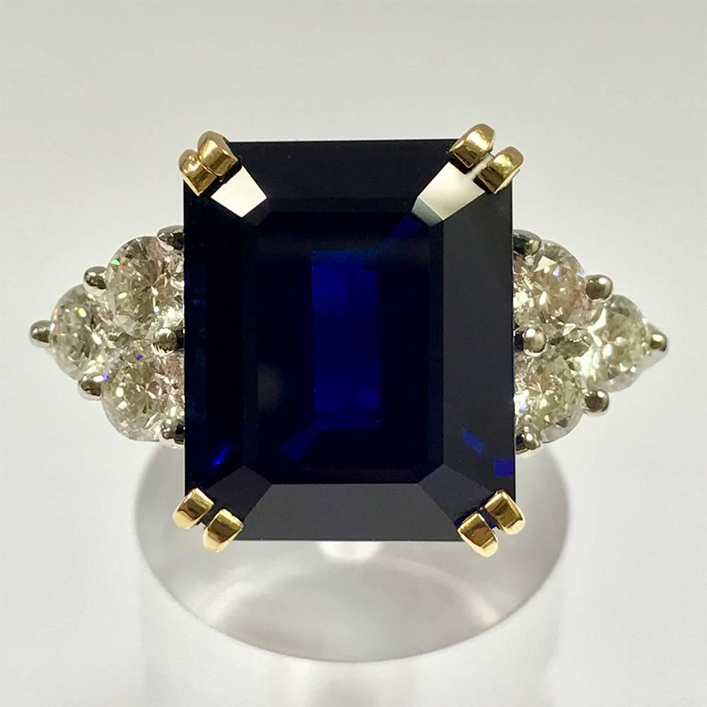 Ceylon Sapphire Diamonds White and Yellow Gold Ring.
Ceylon Sapphire Form Emerald 14,35 Carat
White Diamonds 1,62 Carat Color F/G
White Gold 18 Carat
Yellow Gold 18 Carat