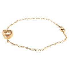 Cartier LOVE Armband aus 18 Karat Gelbgold mit ineinander verschlungenen Ringen, 18 cm