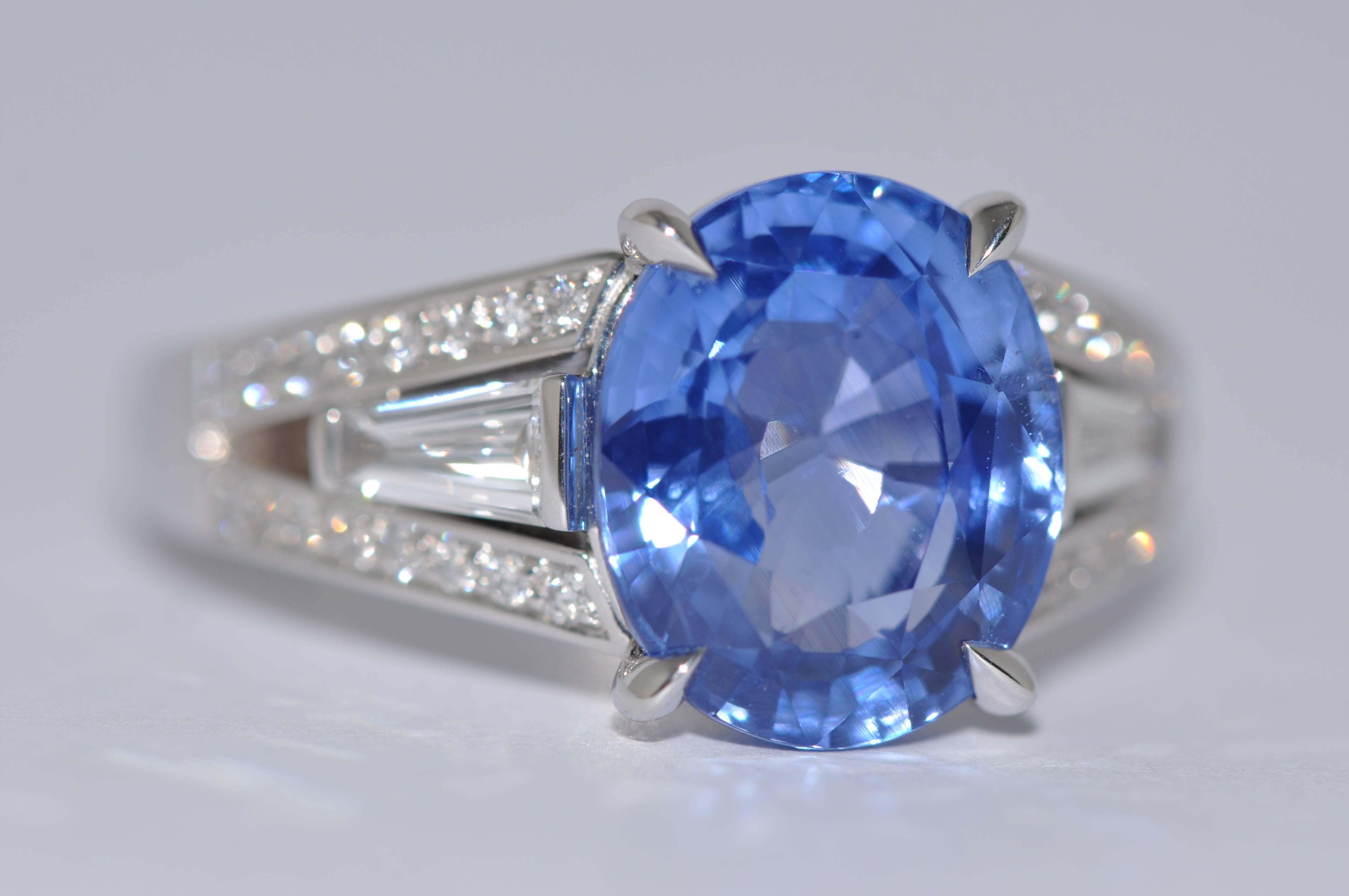 Discover this Madagascar GRS Certified Oval Blue Sapphire 5.91 Carat and Diamonds Palladium Ring.
Madagascar Sapphire 5.91 Carat 
Certification : GRS
Dimensions : 11.05 x 9.25 x 6.17 (mm)
Cut : Modified brilliant/step (5)
Shape : Oval
Color : Blue
2