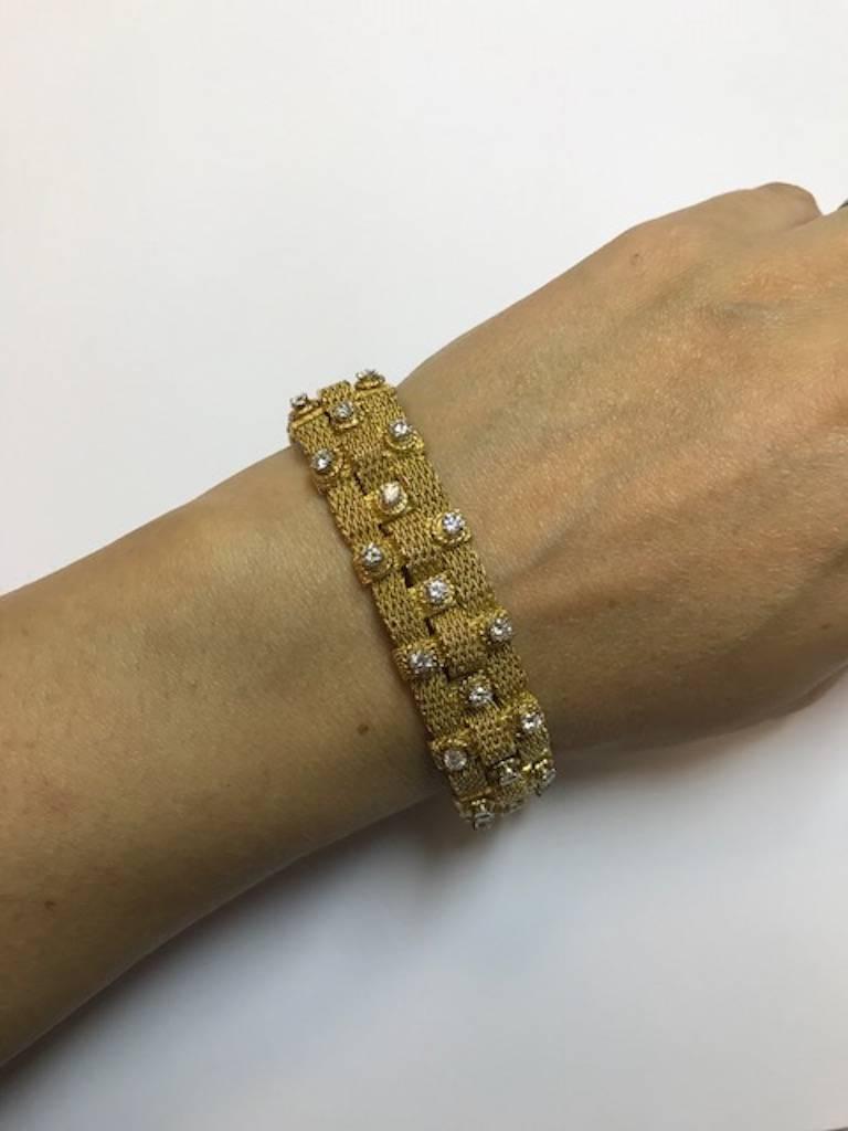 Bulgari eighteen karat yellow gold woven bracelet with 39 round diamonds weighing approximately 3.90 carats. The diamonds are 