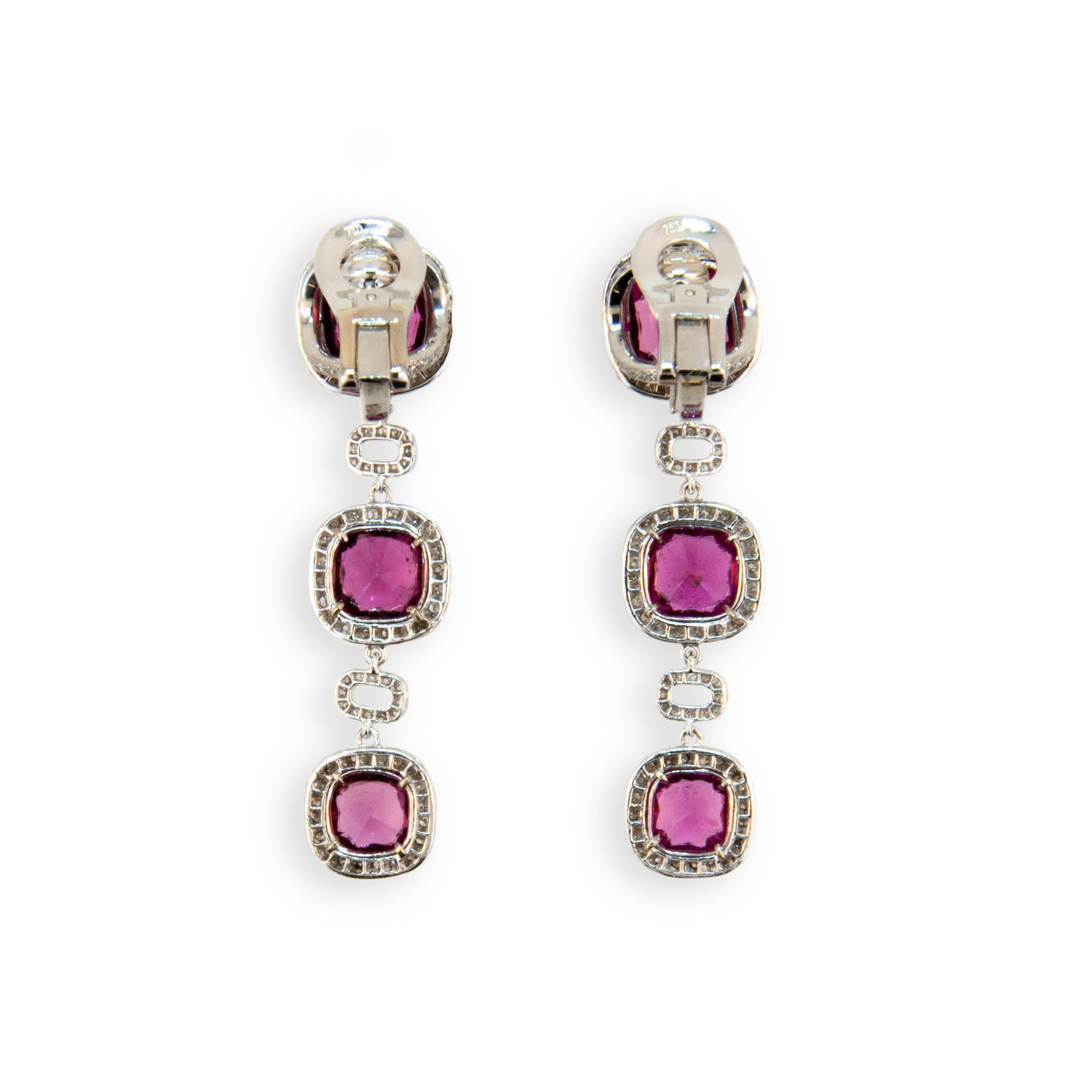 18 karat white gold earrings 9 x 9 mm Rubellite at top with two 8.5 mm and two 7.5 mm Rubellite below 11.57 carats total weight with micro set diamonds surrounding and rectangular diamond sections separating (four hundred sixty four diamonds) 3.01