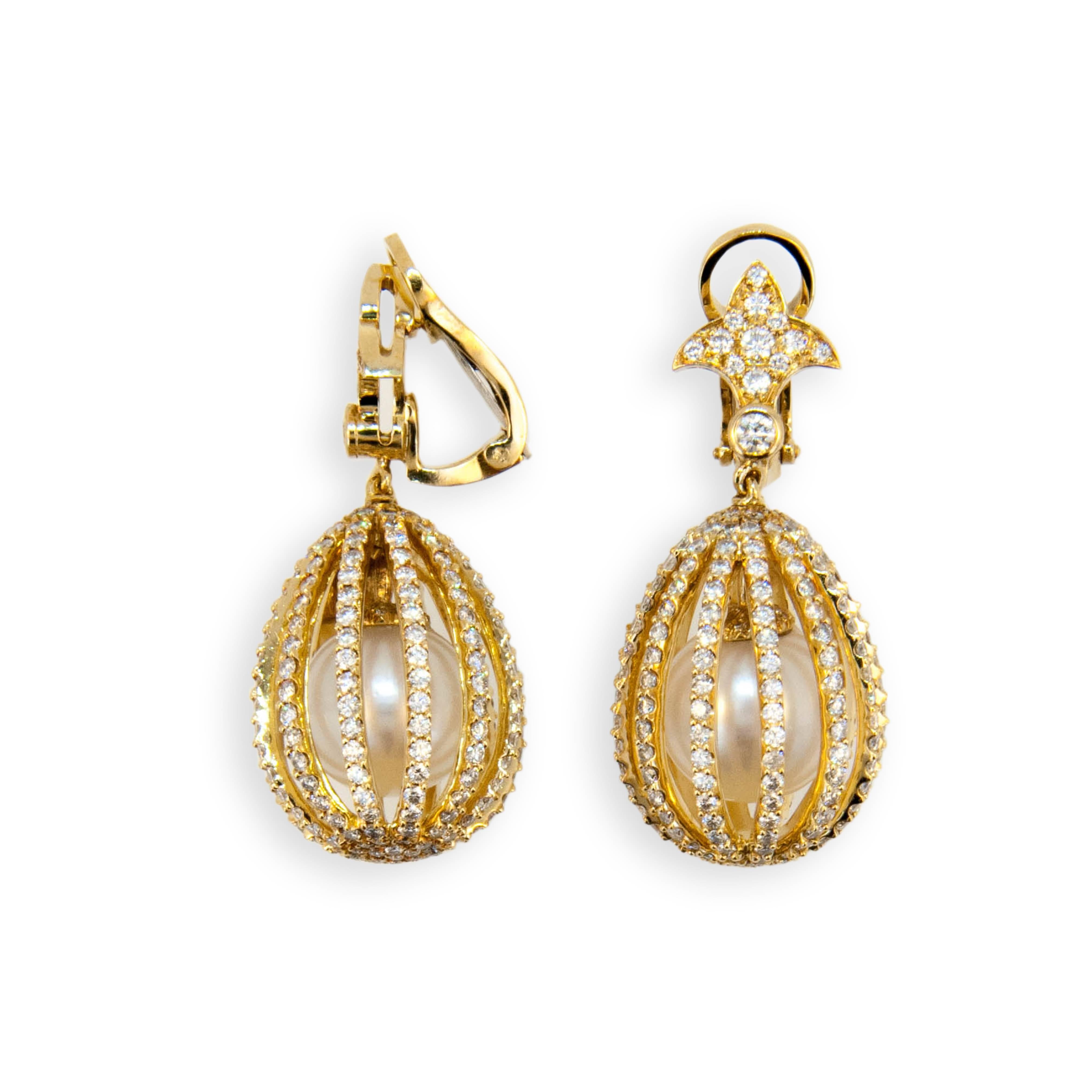 18 karat yellow gold Cage earrings set with 13 mm South Sea Pearls and 500 Diamonds 6.99 carats total weight 