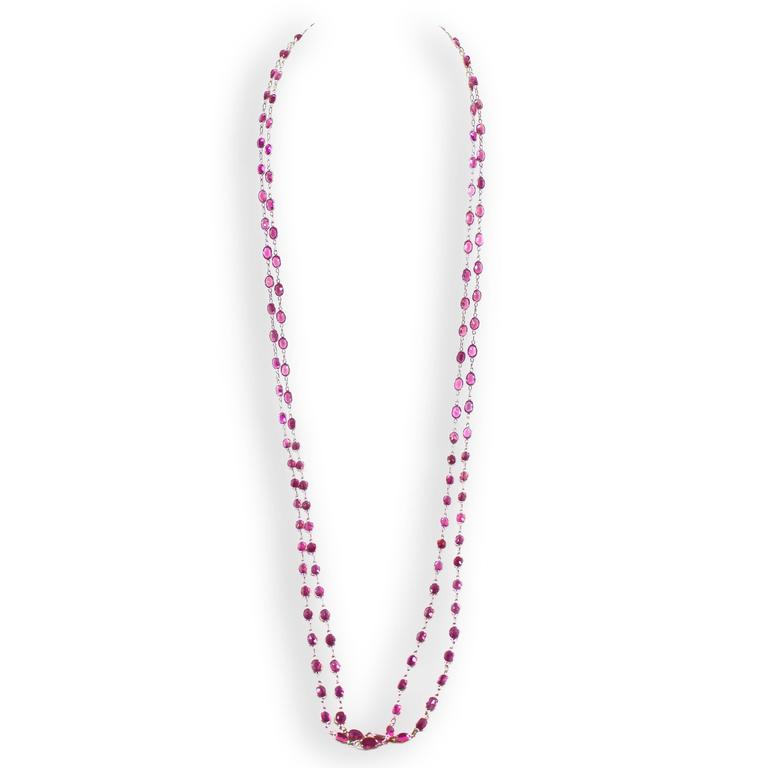 18 karat white gold 90 inch Pink Tourmaline chain 135 oval 7 x 5 mm faceted Pink Tourmaline 100.63 carats total weight