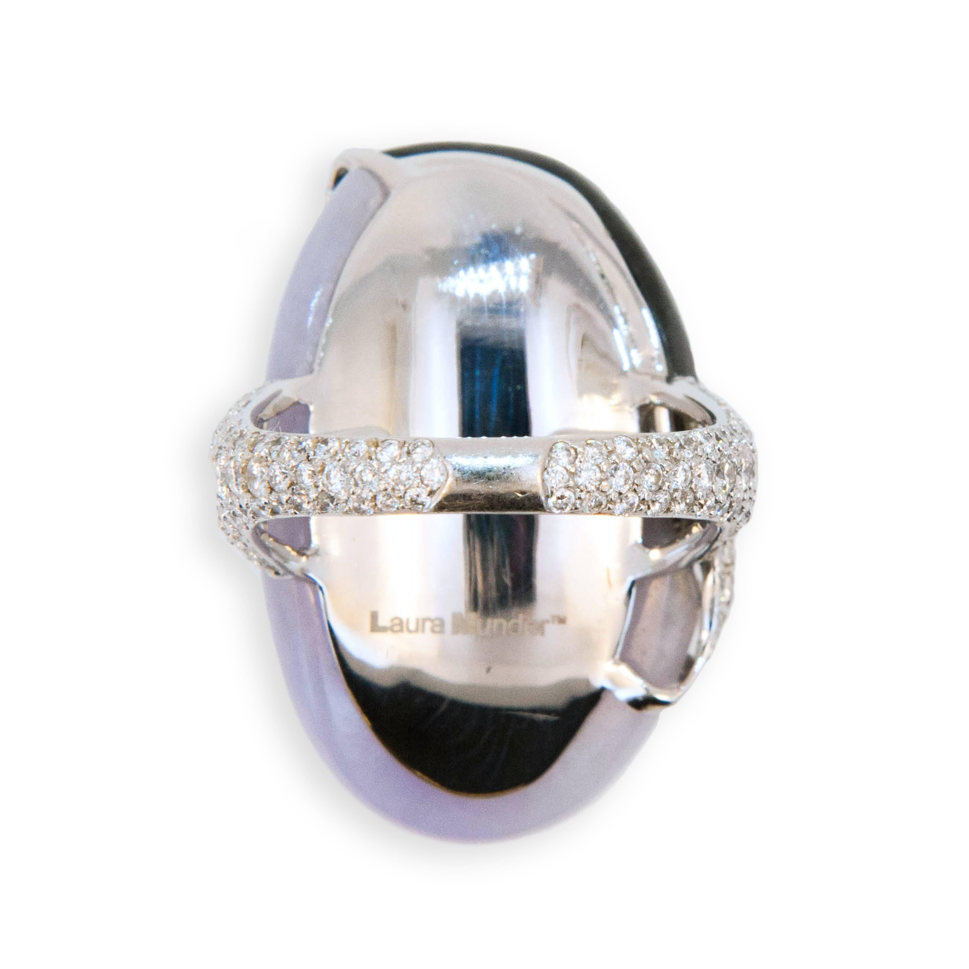 18 karat white gold ring oval curved Lavender and Black Jade with raised flower and leaf design set with diamonds, shank is pave' set with diamonds 143 diamonds 2.10 carats total weight.  Size 7 plus with a horseshoe.
