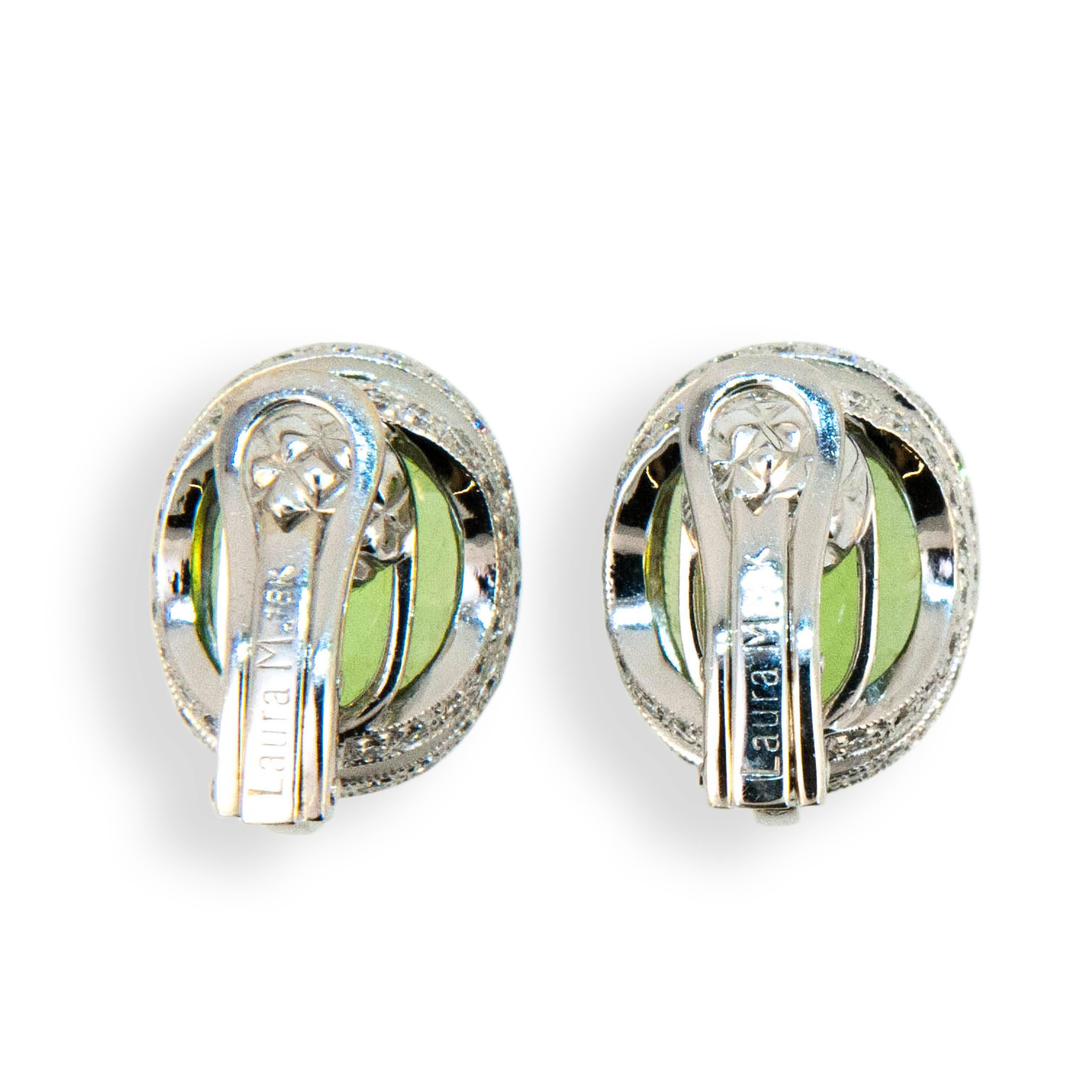 18 karat white gold oval checker cut peridot earrings with diamonds. Peridot are 8.65 carats total weight and diamonds 1.20 carats total weight. Earrings are clip on, posts could be added.