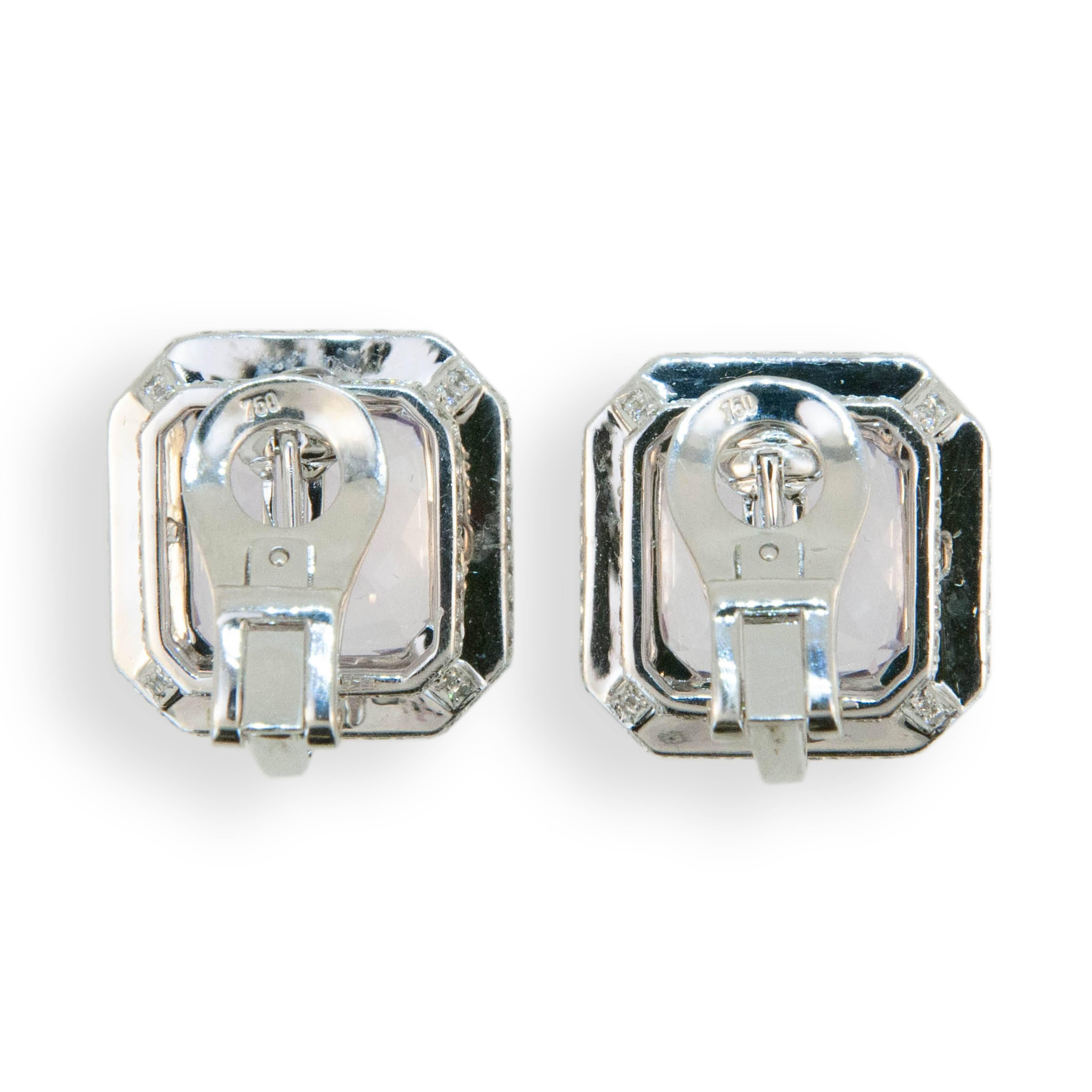 18 karat white gold earrings set with octagonal Kunzite 21.83 carats total weight and micro-set with 232 round diamonds 1.93 carats total weight. Earrings may be worn as clips or pierced, posts fold down.