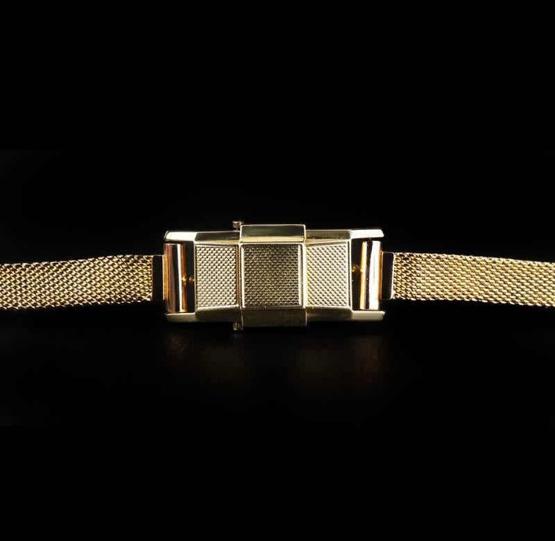 A Very Rare 1930's 18k Yellow Gold Duo Plan Ladies Wristwatch, silver dial with index batons, an 18k yellow gold bracelet with an 18k yellow gold pin buckle (not by JLC), mineral glass, manual wind movement, in excellent condition, comes with a