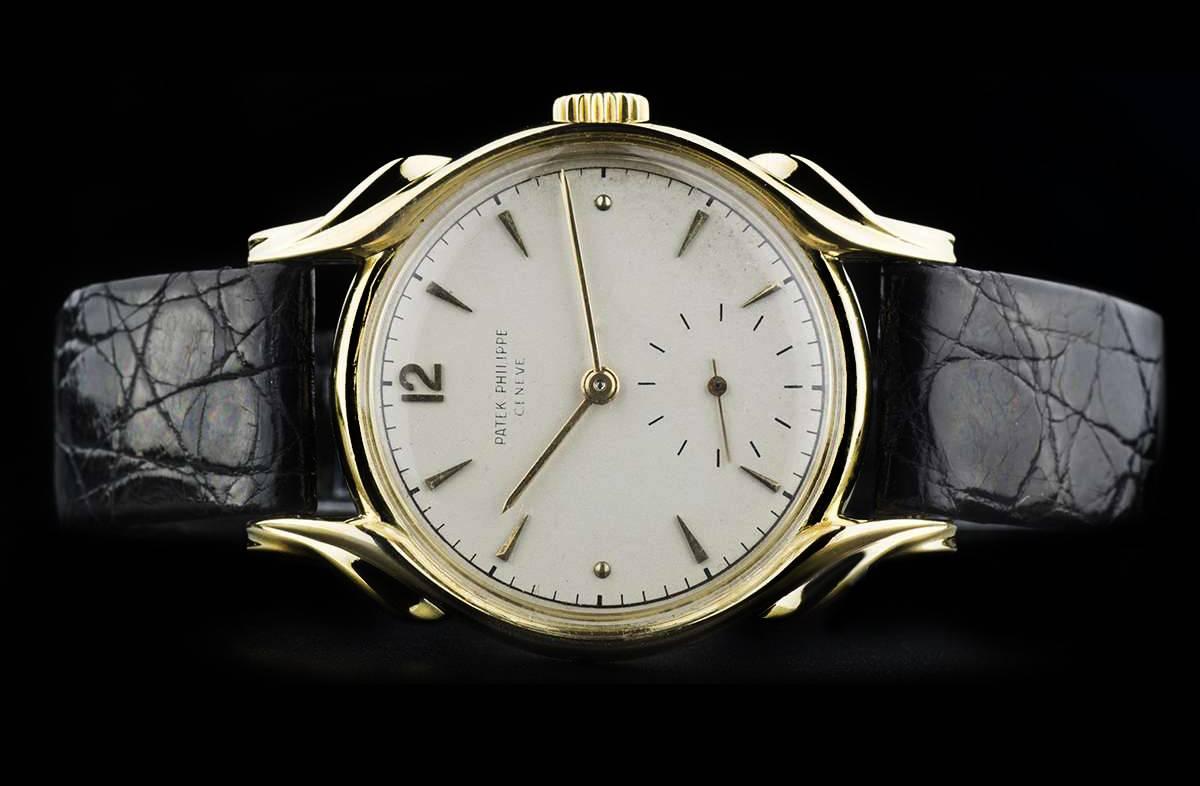 Patek Philippe Yellow Gold Flame Lugs Rare Calatrava Wristwatch, 1953 In Excellent Condition In London, GB