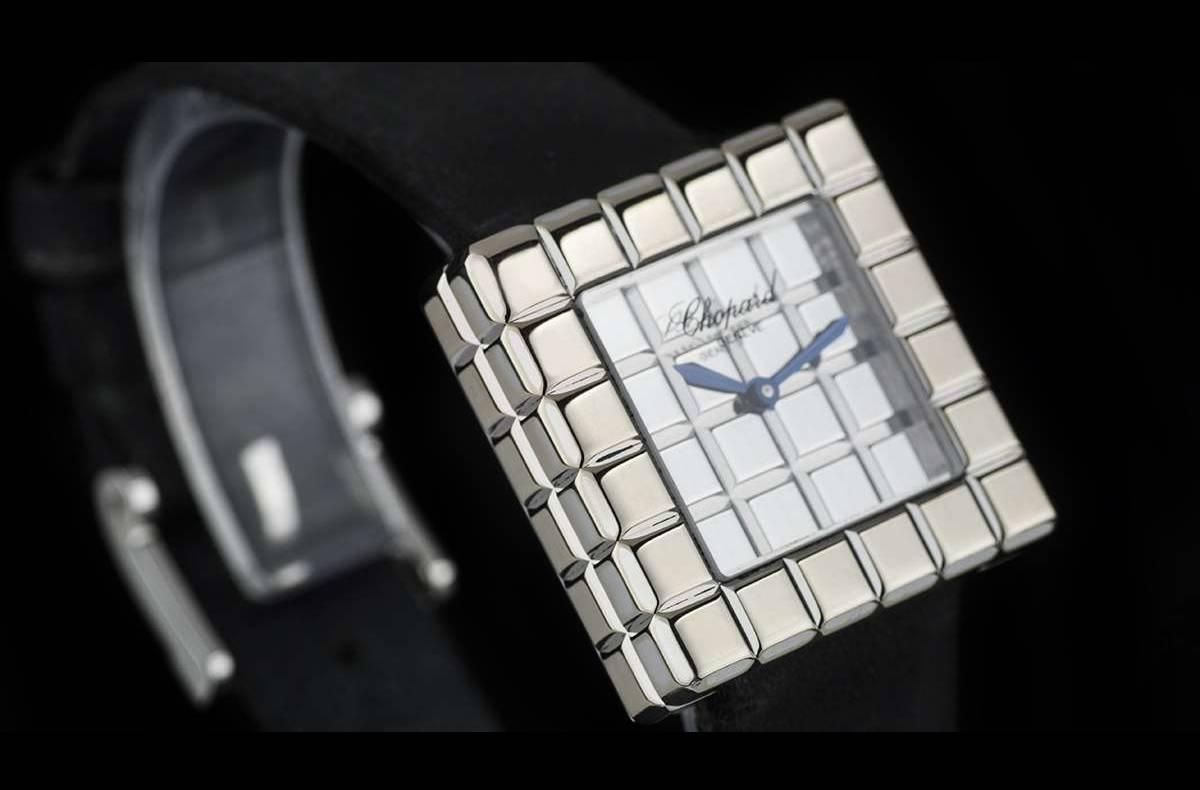 An 18k White Gold Ice Cube Ladies Wristwatch 12/7407, mirror dial, a brand new original black leather strap with an original 18k white gold pin buckle (not as pictured), sapphire glass, quartz movement, in excellent condition, comes with a Chopard