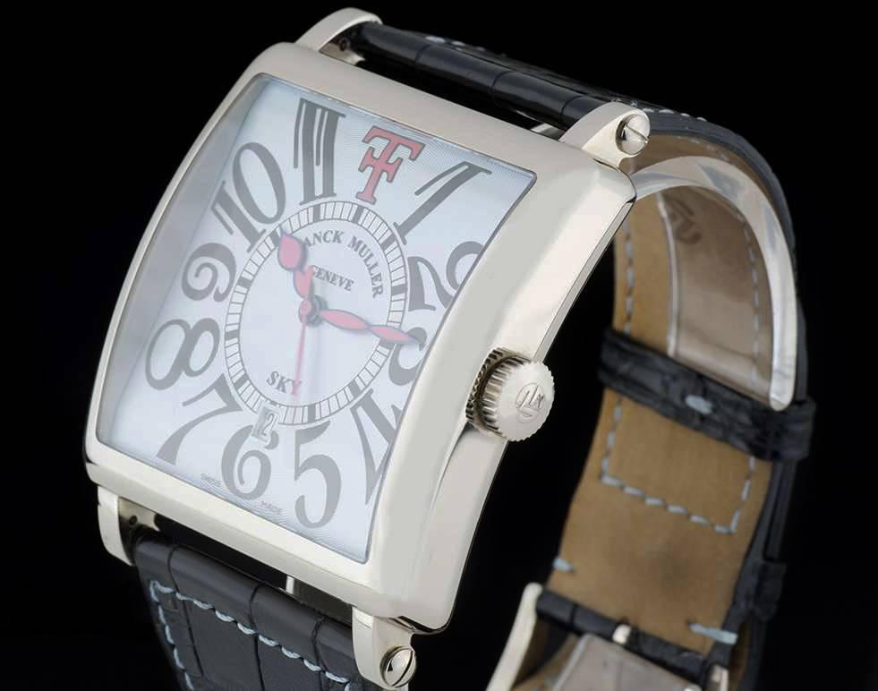 An 18k White Gold Cortez Theo Fennell Sky Limited Edition Gents Wristwatch 6000 K SC DT, blue guilloche dial with arabic numbers, date aperture at 6 0'clock, an 18k white gold polished bezel, an original black leather strap with an original 18k