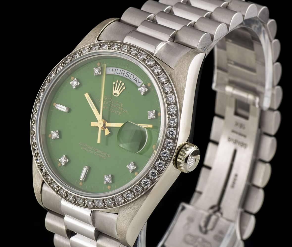 A Very Rare White Gold Oyster Perpetual Day-Date Gents Wristwatch, original green Stella dial with 10 applied round brilliant cut diamond and 2 baguette cut diamond hour markers, day at 12 0'clock, date at 3 0'clock, an white gold fixed bezel set