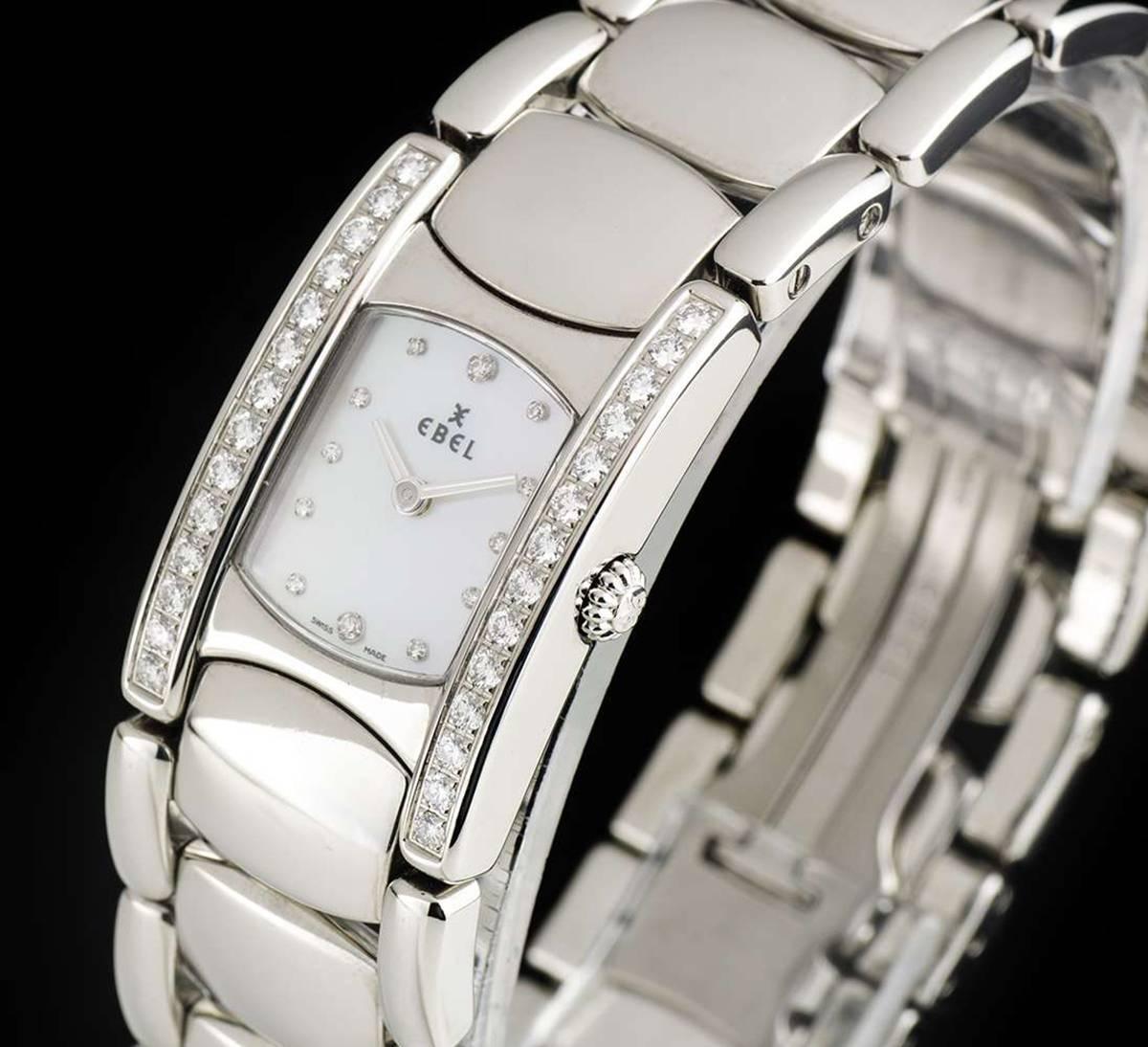 A Stainless Steel Beluga Manchette Ladies Wristwatch, mother of pearl dial with 12 applied round brilliant cut diamond hour markers, a fixed stainless steel bezel, a stainless steel case set with a single row of approximately 14 round brilliant cut