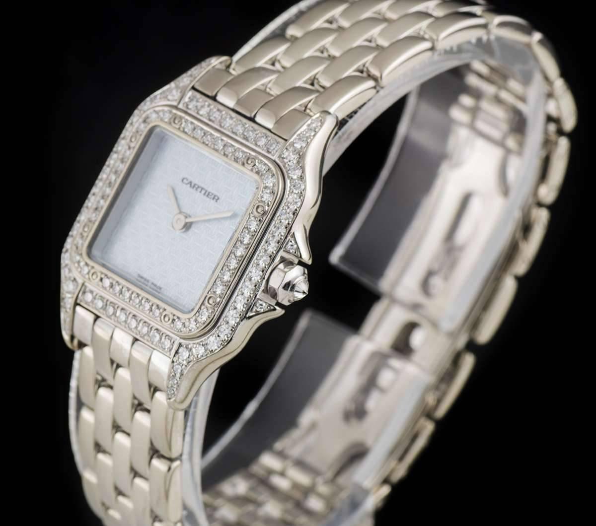 A White Gold Panthere Ladies Wristwatch, sky blue enamel logo dial, a fixed white gold bezel set with approximately 32 round brilliant cut diamonds, white gold case, lugs and crown guard set with approximately 62 round brilliant cut diamonds, a