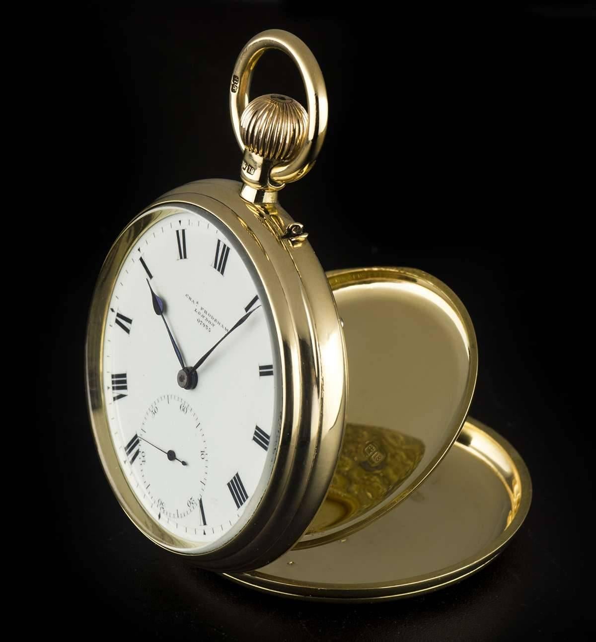 A Gold Open Face Pocket Watch, cream enamel dial with roman numerals, small seconds at 6 0'clock, a fixed gold bezel and case, plastic glass, 3/4 plate lever movement with engraved raised barrels and original fully blued screws, in excellent