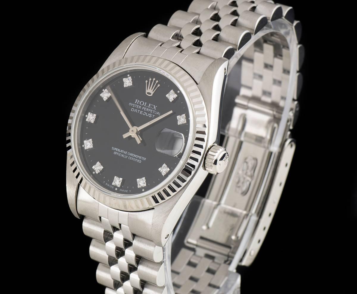 A Steel Oyster Perpetual Datejust Mid-Size Wristwatch, black dial with 10 applied round brilliant cut diamond hour markers, date at 3 0'clock, a fixed white gold fluted bezel, steel jubilee bracelet with a steel deployant clasp, sapphire glass,