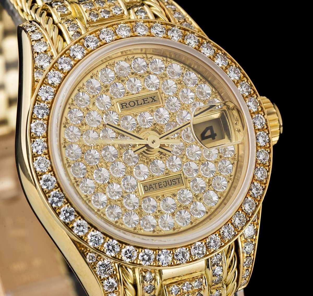 An Unworn Gold Fully Loaded Pave Diamond Set Oyster Perpetual Datejust Ladies Wristwatch, pavé diamond dial set with rose cut diamonds, date at  3 0'clock, a fixed gold bezel set with approximately 40 round brilliant cut diamonds, a gold case set