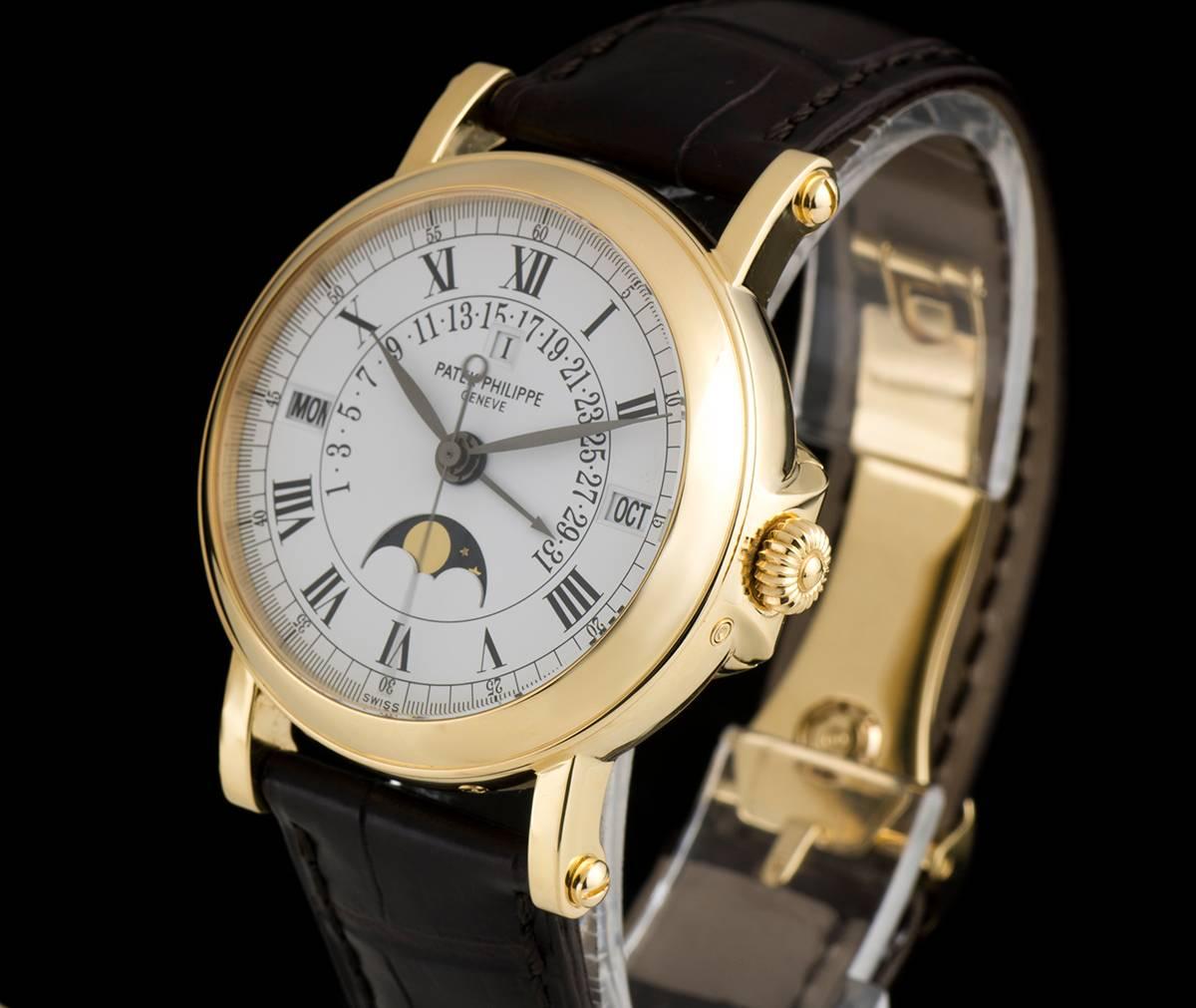 An 18k Yellow Gold Perpetual Calendar Retrograde Gents Wristwatch, white dial with roman numerals, month at 3 0'clock, retrograde date displayed between 8 and 4 0'clock, moonphase aperture at 6 0'clock, weekday at 9 0'clock, leap year indicator at