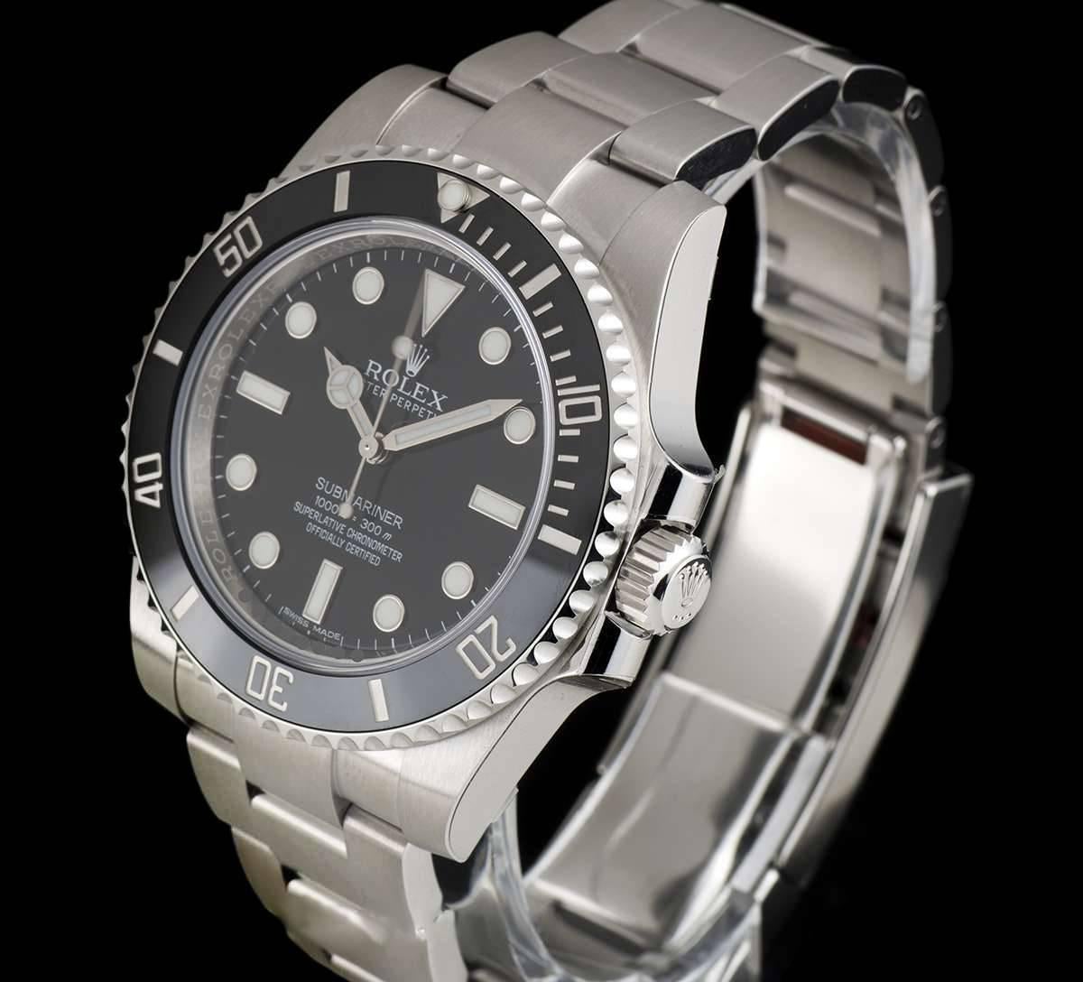 An Unworn Stainless Steel Oyster Perpetual Non-Date Submariner Gents Wristwatch, black dial with applied hour markers, a stainless steel uni-directional rotating bezel with a black ceramic insert, a stainless steel oyster bracelet with a stainless