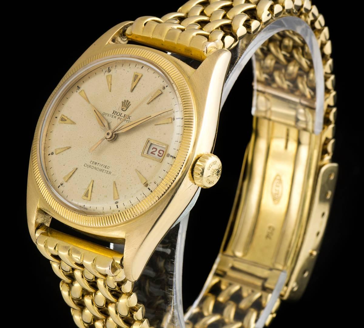 A Rare 18k Yellow Gold Semi Bubble Back Oyster Perpetual Vintage Gents Wristwatch, silvered dial with applied hour markers, a fixed 18k yellow gold coin edge bezel, a very rare original 18k yellow gold bracelet with an original 18k yellow gold