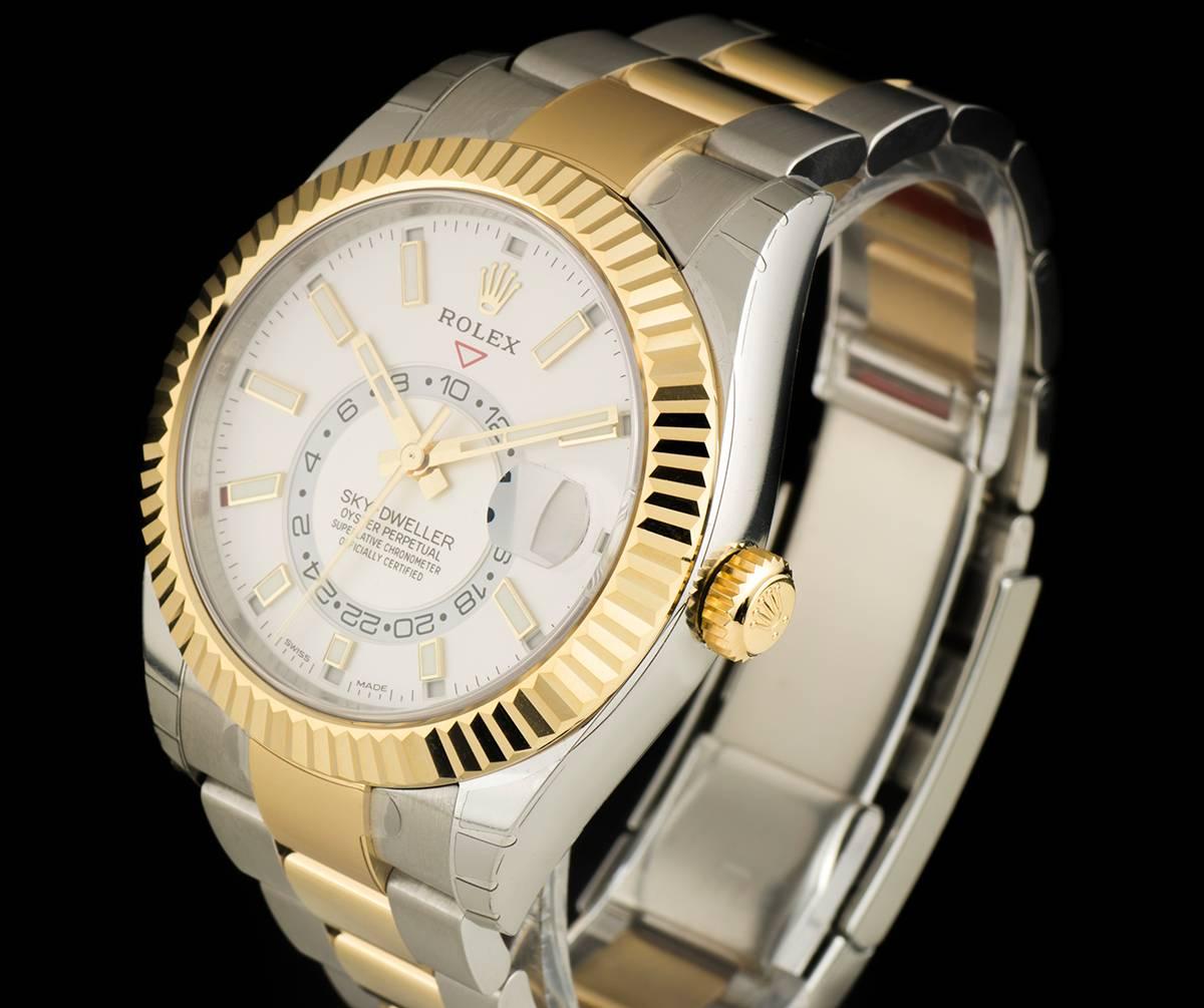 An Unworn Stainless Steel & 18k Yellow Gold Oyster Perpetual Annual Calendar Sky-Dweller Gents Wristwatch, white dial with applied hour markers, date at 3 0'clock, 24-hour display, second time zone, annual calendar with saros system and month