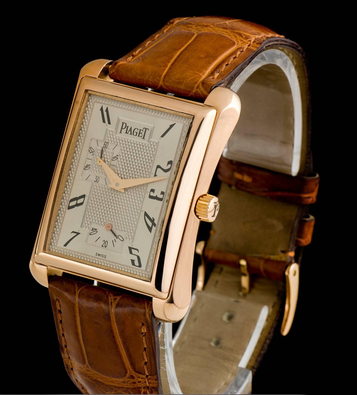 An 18k Rose Gold Emperador Power Reserve Gents Wristwatch, silver dial with arabic numbers, power reserve display at 6 0'clock, small seconds at 9 0'clock, a fixed 18k rose gold bezel, an original brown leather strap with an original 18k rose gold