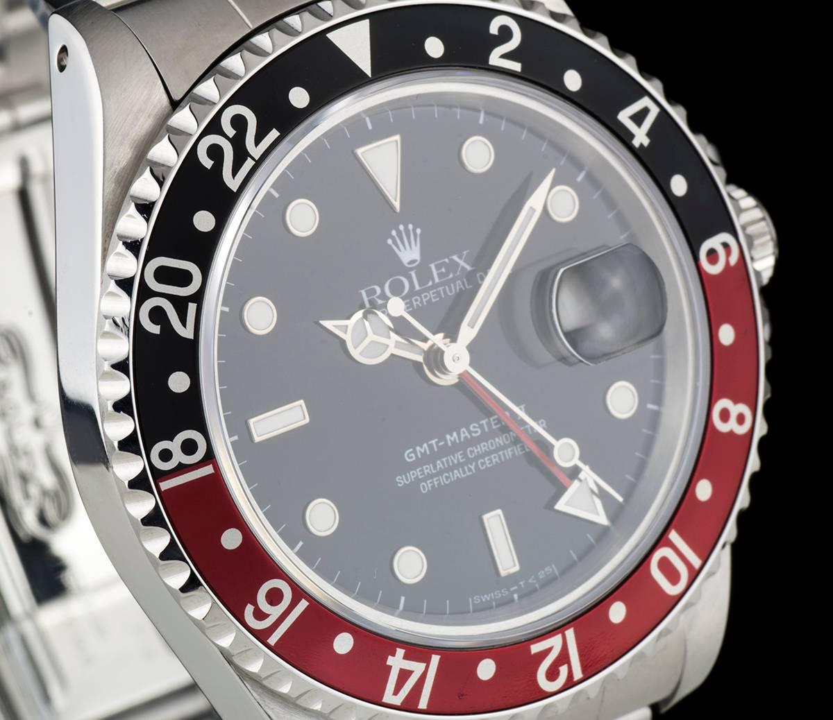 A Stainless Steel Oyster Perpetual GMT-Master II Gents Wristwatch, black dial with applied hour markers, date at 3 0'clock, red GMT hand, a stainless steel bi-directional rotating bezel with a black and red "coke" bezel insert, a stainless