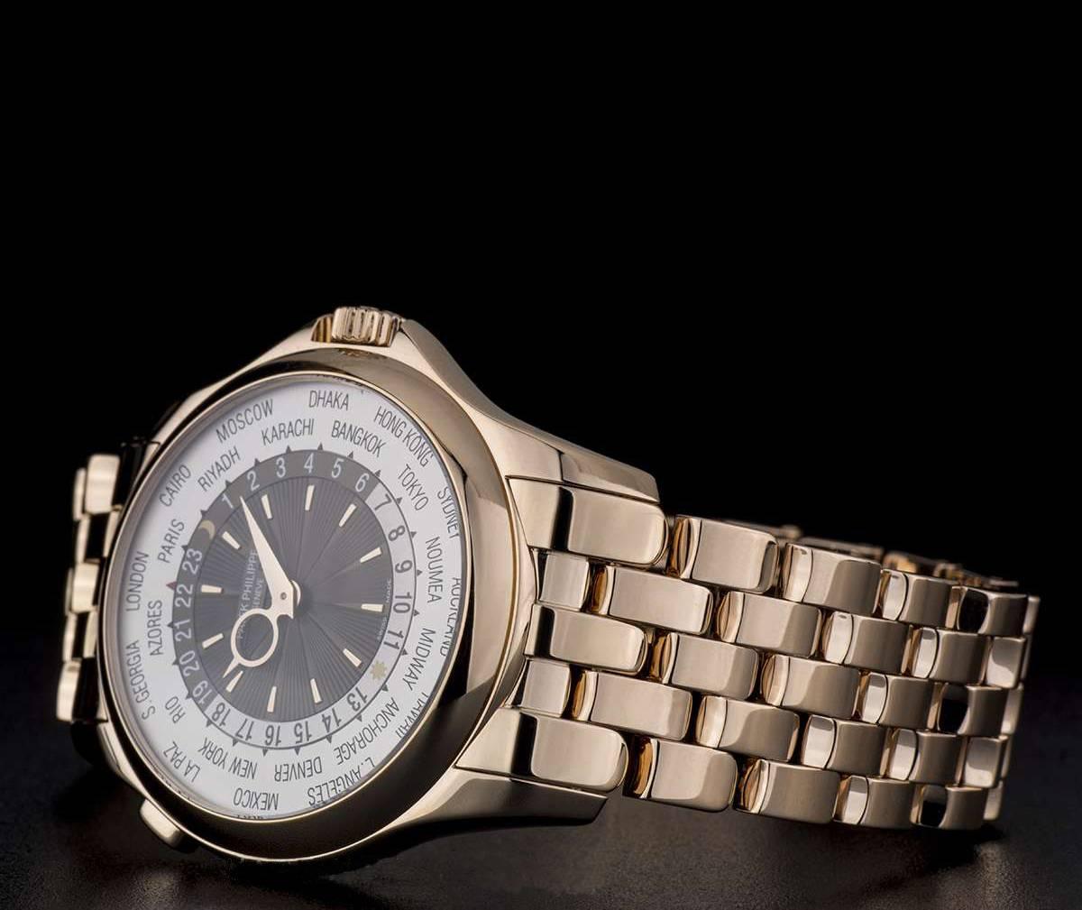 Men's Patek Philippe Rose Gold World Time Sunburst Dial Automatic Wristwatch