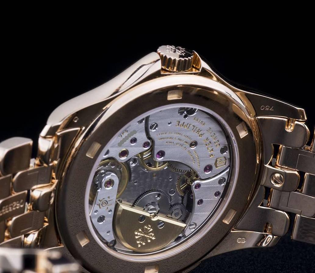 Patek Philippe Rose Gold World Time Sunburst Dial Automatic Wristwatch 1