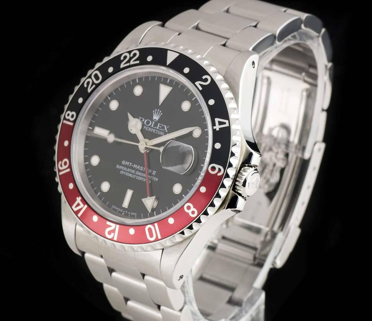 A Stainless Steel Oyster Perpetual GMT-Master II Gents Wristwatch, black dial with applied hour markers, date at 3 0'clock, red GMT hand, a stainless steel bi-directional rotating bezel with a black and red "coke" bezel insert, a stainless