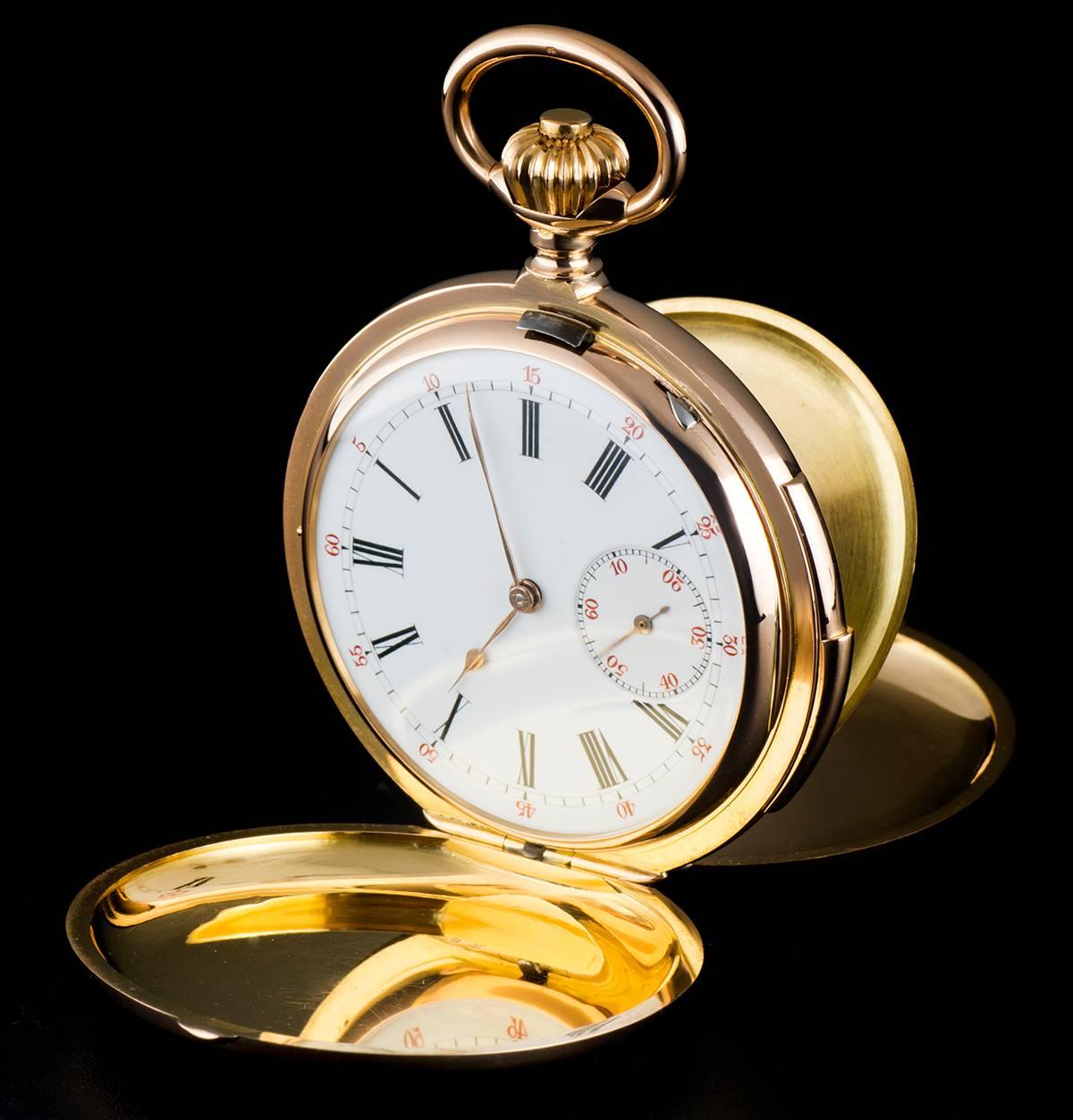 An 18k Rose Gold Minute Repeater Full Hunter Pocket Watch, white enamel dial with roman numerals, small seconds at 6 0'clock, a fixed 18k rose gold bezel and case, an 18k rose gold inner cuvette case, plastic glass, wolf tooth manual wind lever