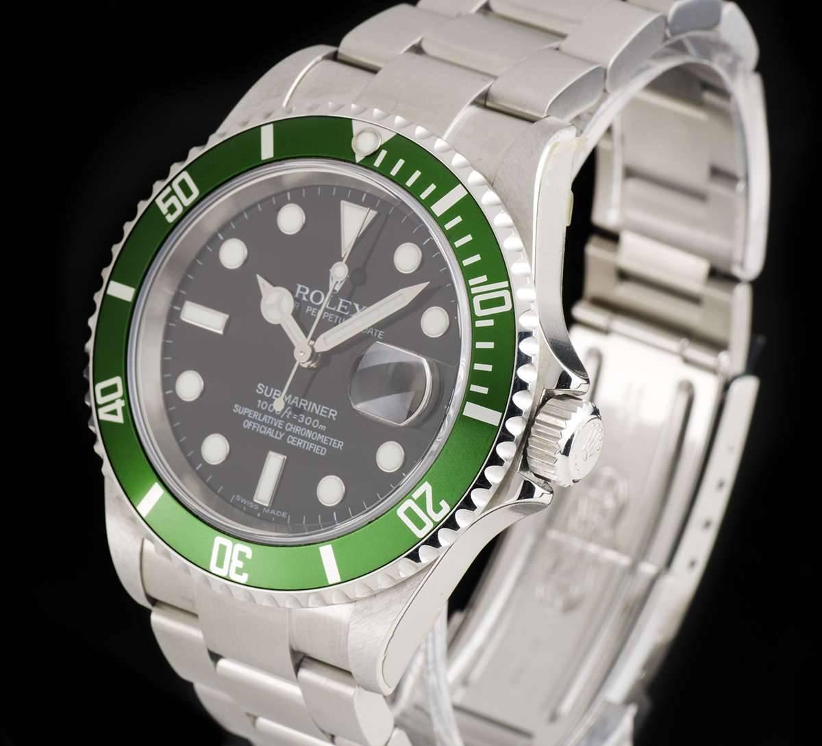 An Unworn Stainless Steel Oyster Perpetual Submariner Date NOS Gents Wristwatch, black dial with applied hour markers, date at 3 0'clock, a stainless steel uni-directional rotating bezel with a green bezel insert, a stainless steel oyster bracelet
