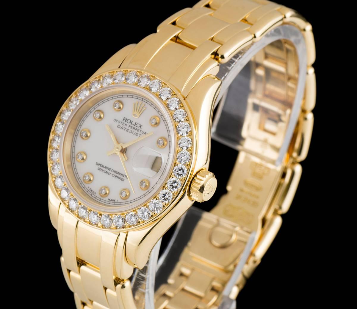 An 18k Yellow Gold Oyster Perpetual Pearlmaster Datejust Ladies Wristwatch, white dial with 10 applied round brilliant cut hour markers, date at 3 0'clock, a fixed 18k yellow gold bezel set with approximately 32 round brilliant cut diamonds, an 18k