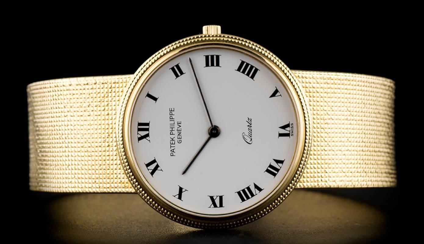 Patek Philippe White Enamel Dial Gold Quartz  Calatrava Wristwatch In Excellent Condition In London, GB