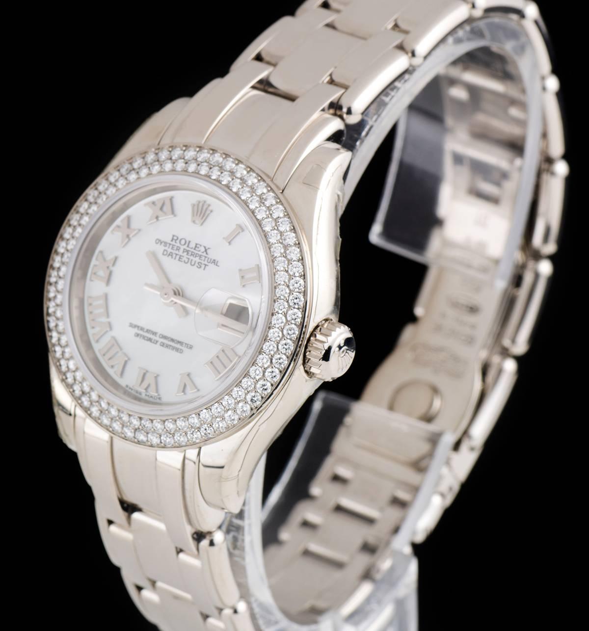 An Unworn 18k White Gold Oyster Perpetual Pearlmaster Datejust NOS Ladies Wristwatch, white mother of pearl dial with applied roman numerals, date a 3 0'clock, a fixed 18k white gold bezel set with approximately 116 round brilliant cut diamonds, an